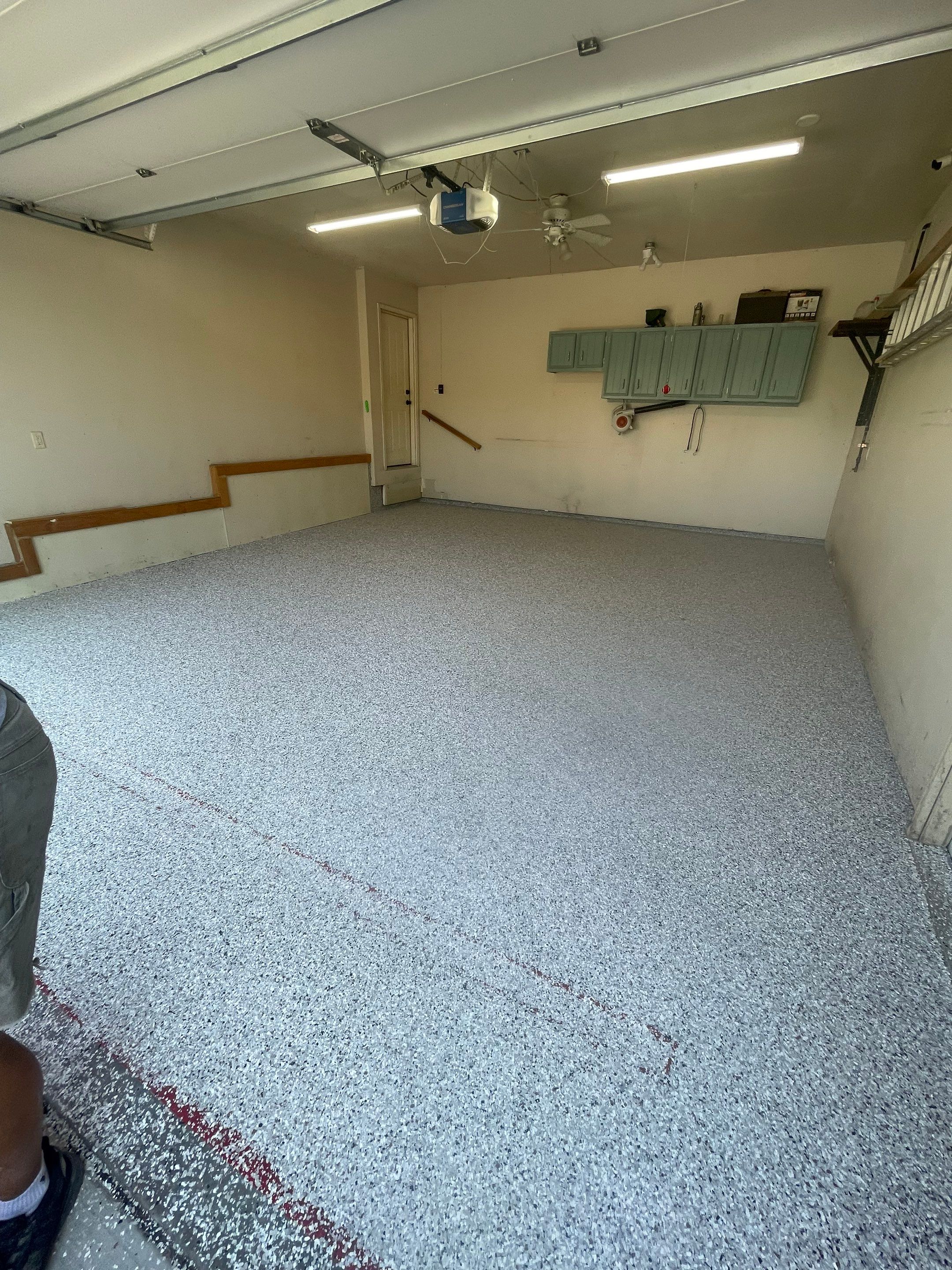 Multi-Stall Garage Floor Coating Installation in Sioux Falls by Select Painting, Coatings & Garage Cabinets