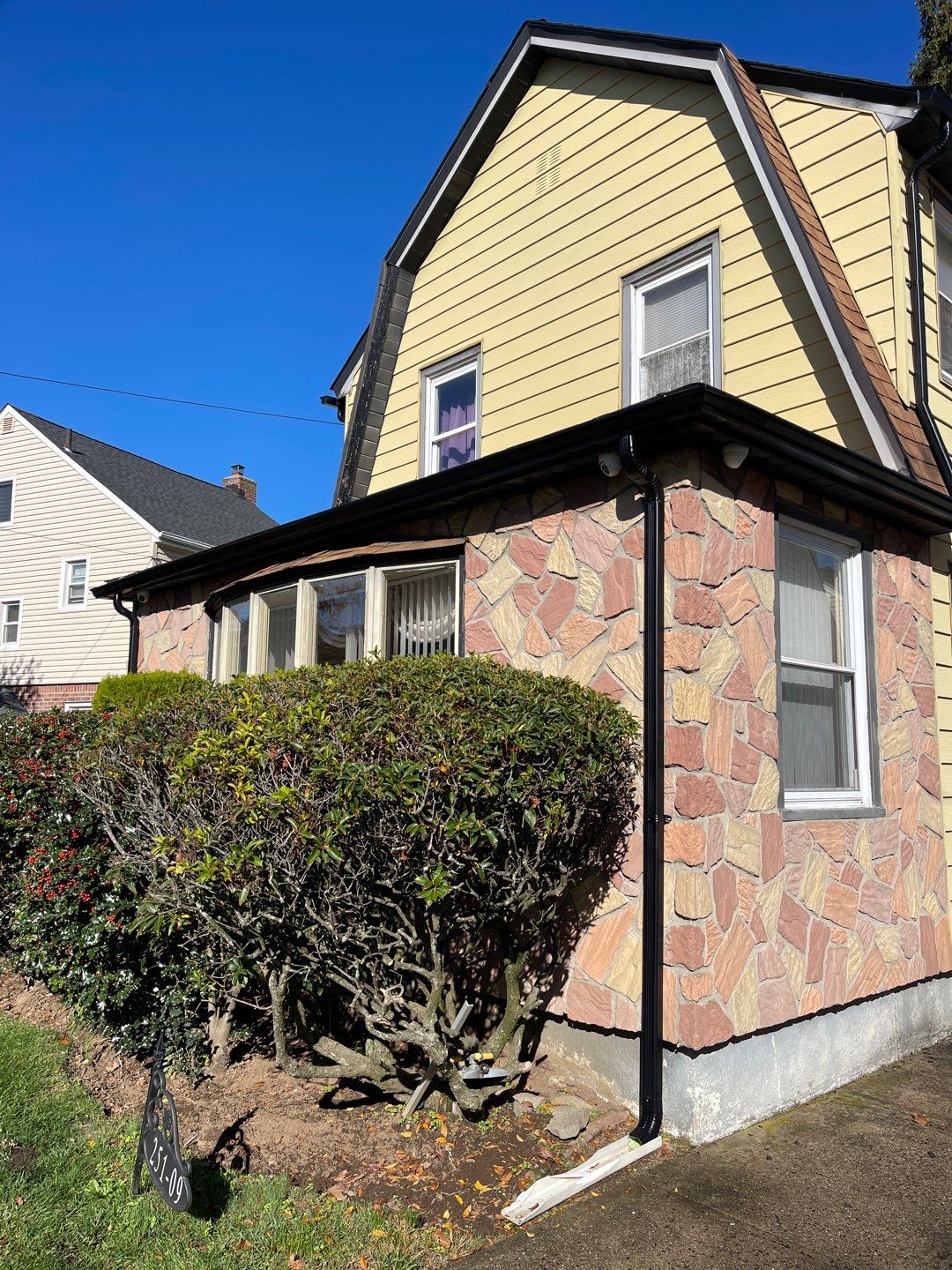 Full House Installation 5" black seamless gutters and 2x3 leaders using 5" black K style seamless gutters and 2x3 black leaders by Above All Gutters 