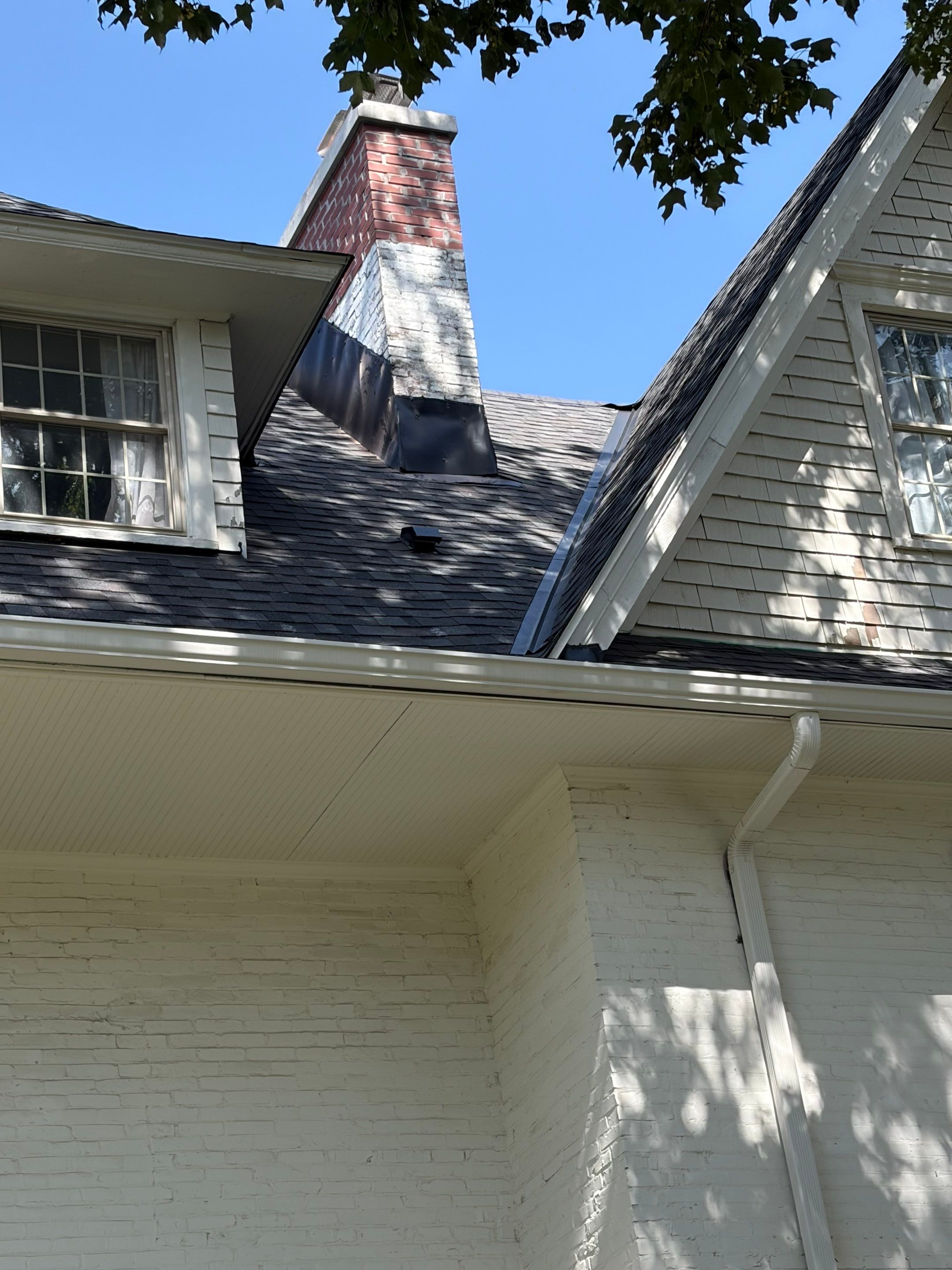 Brick Chimney Flashing and Roof Repair in Kansas City by Summit Roofing