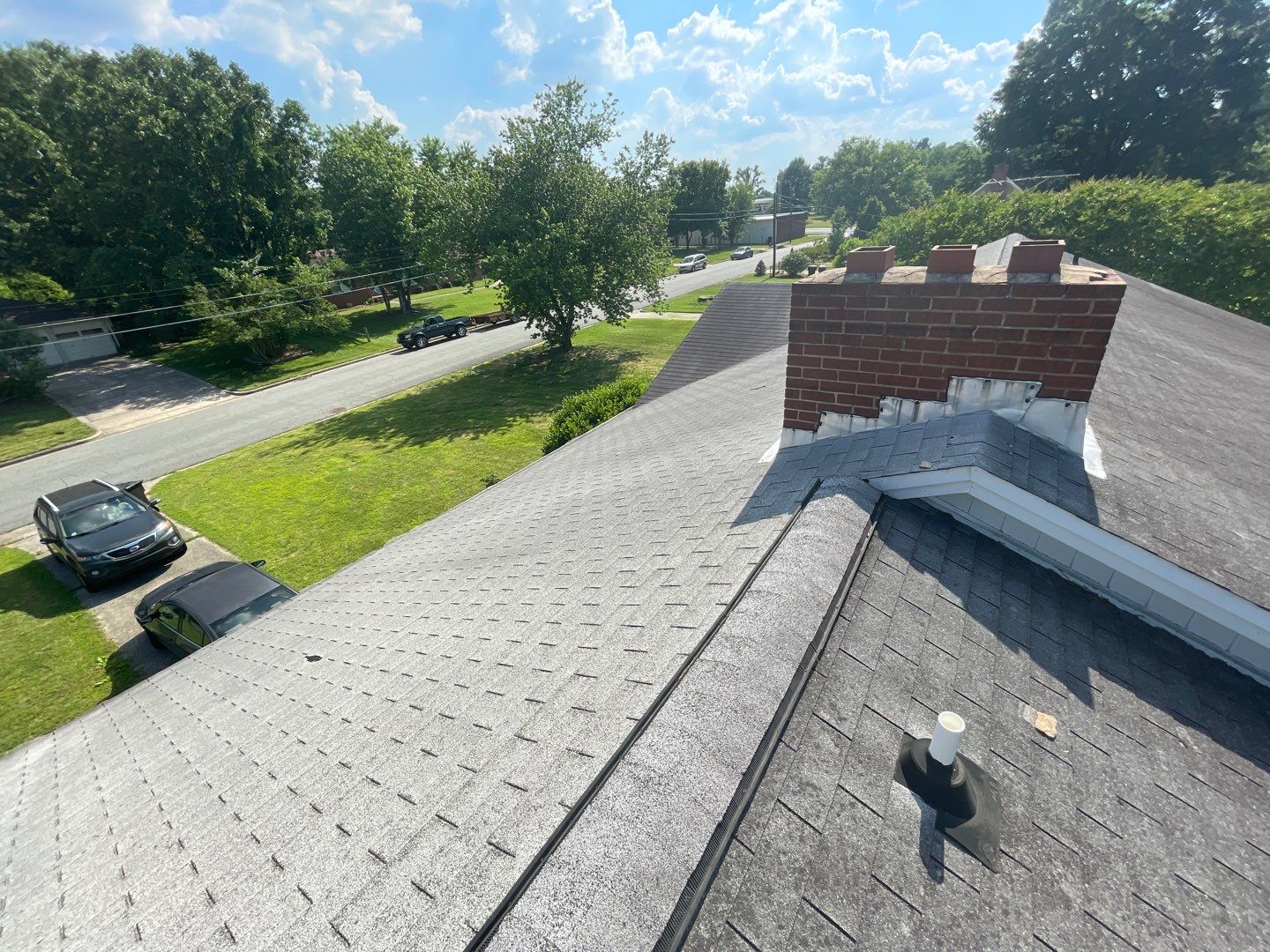Carolina Blue Standing Seam Roof by Just In Time Roofing and Restoration