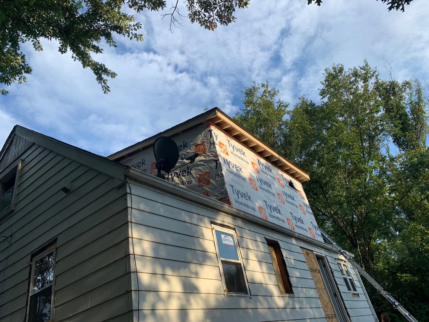 Room addition on the second floor of house by Greenspring Construction Services