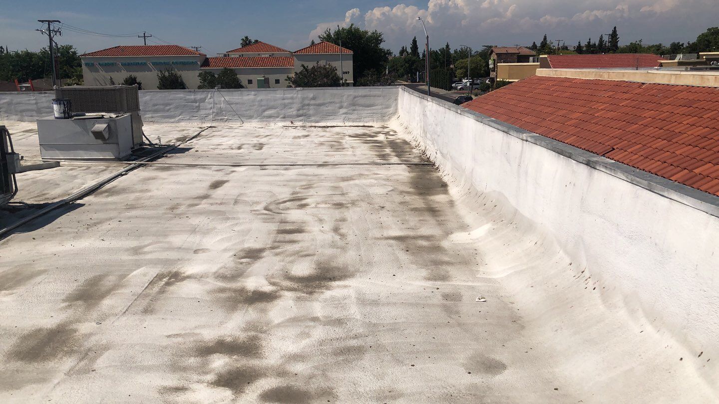 Reburbish existing spray foam job by Straight Edge Roofing Inc