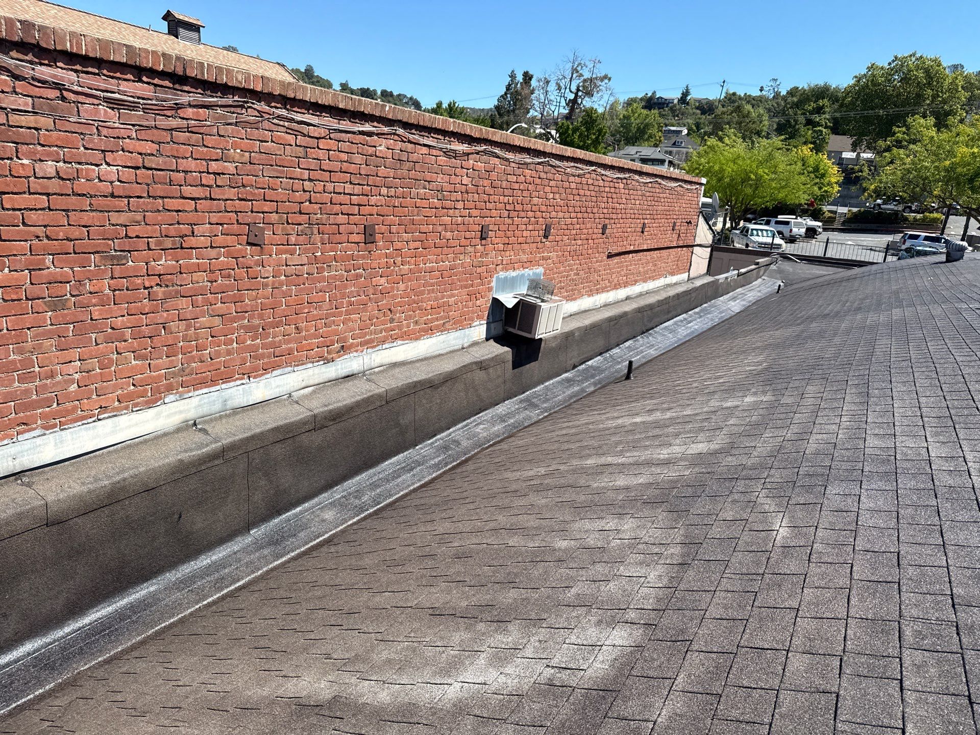 Foam and coatings on commercial roof by Straight Edge Roofing Inc