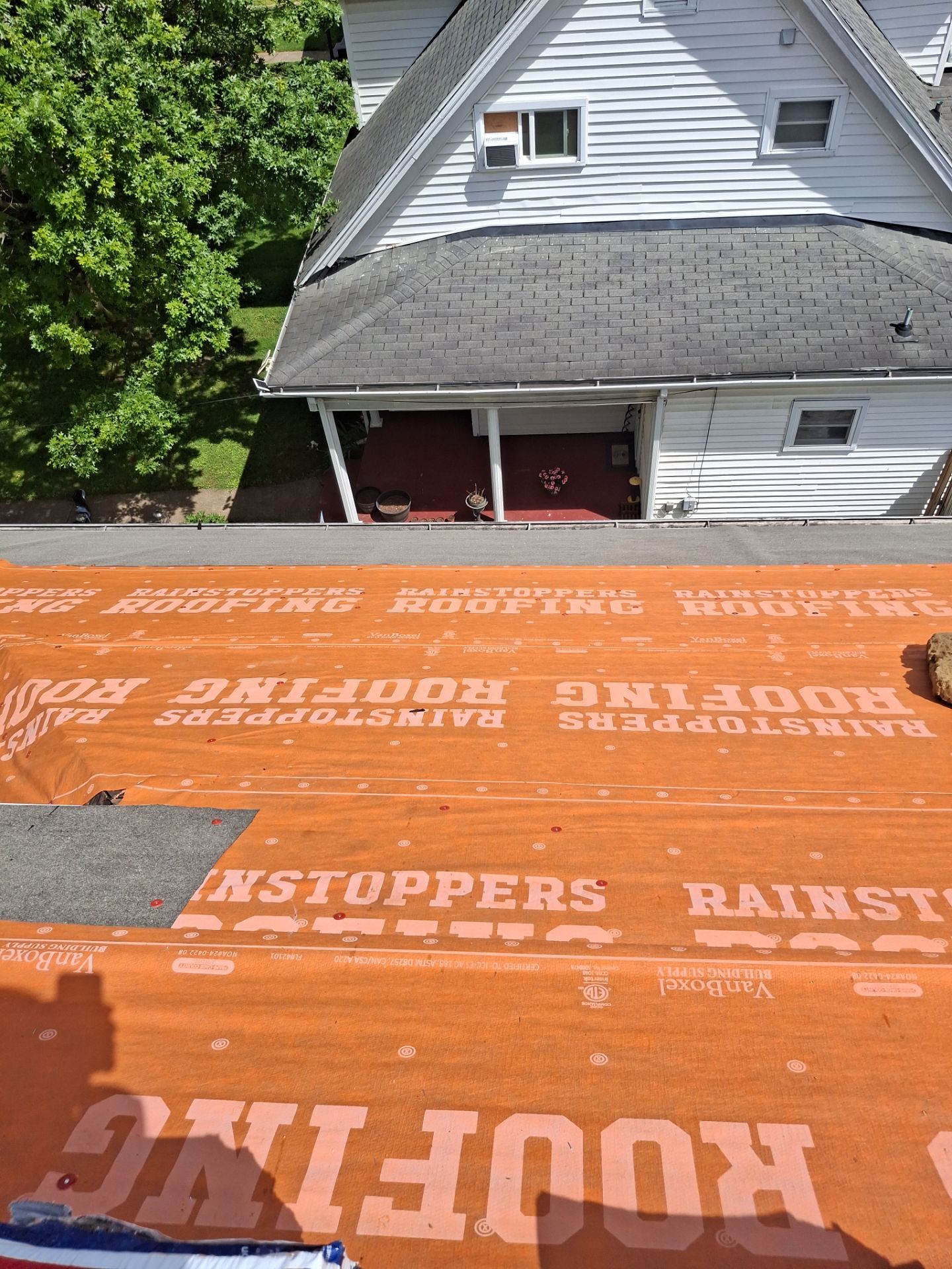 Residential Roofing Installation using GAF Timberline HDZ Charcoal by Rainstoppers Roofing