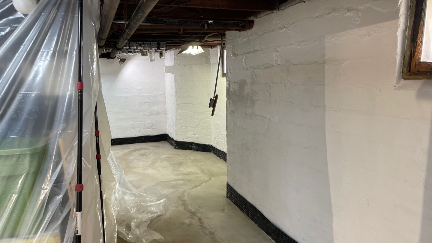 Interior Drain Tile & Foundation Crack Repair in Northeast Minneapolis by Waterproofing Northeast