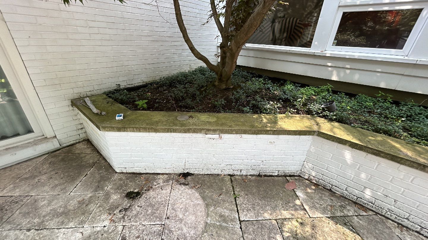 marble patio cleaning and sanding using Polysweep polymeric sand by Northern Power Washing LLC.