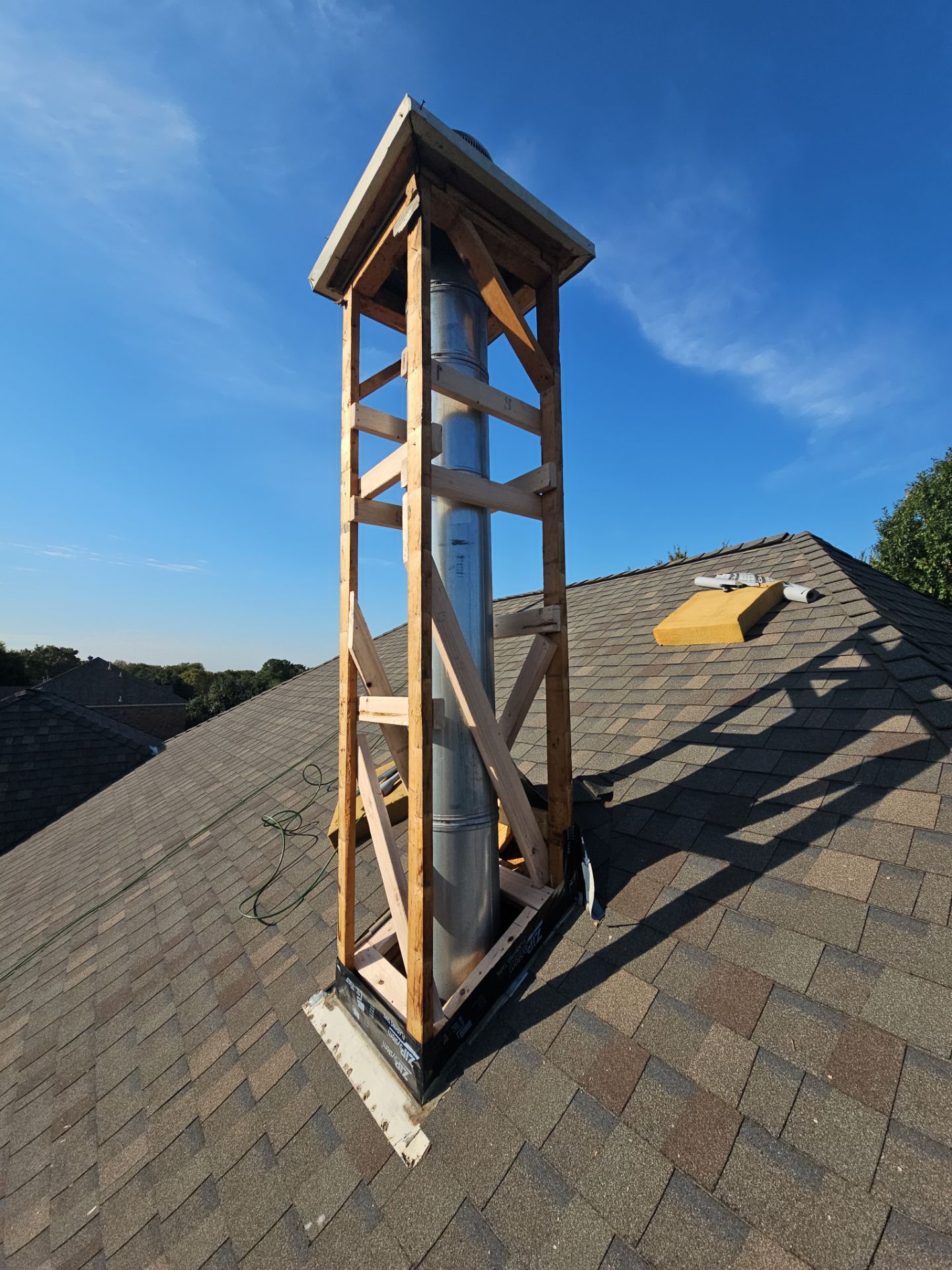 chimney repair using lap engineered treated composite siding. by road roofing llc