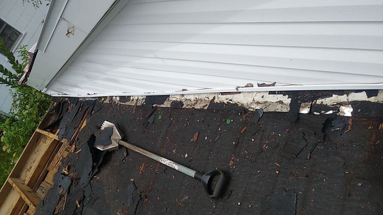 Residential Roofing Installation using Roof Replacement by American Roofing & Construction LLC
