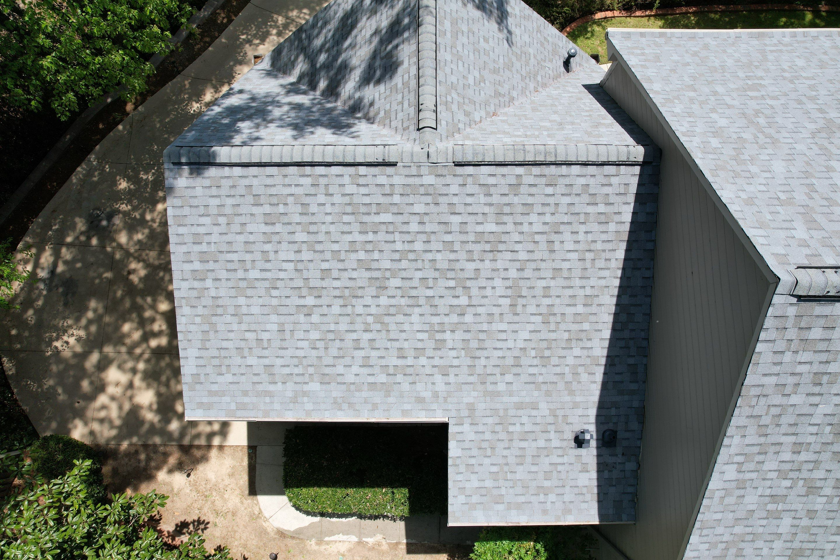 Residential Roofing Installation using Owens Corning Quary Gray by Inspector Roofing and Restoration