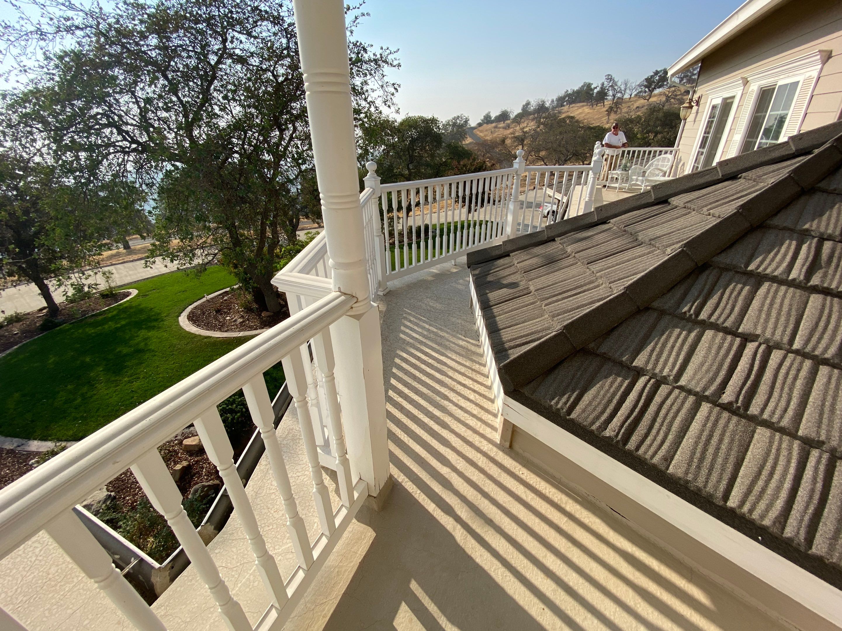 Sealant system over walk deck over house using Rubber coat and coatings by Straight Edge Roofing Inc