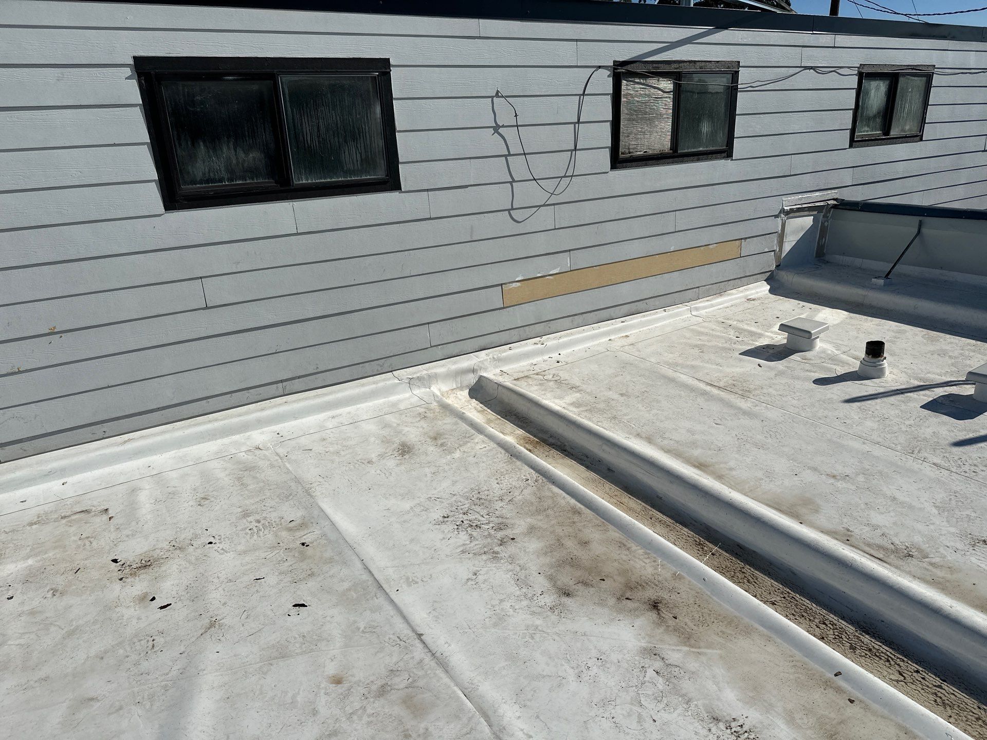 Commercial Roofing Installation using GAF 60Mil TPO  by Orezona Building & Roofing Company, Inc.