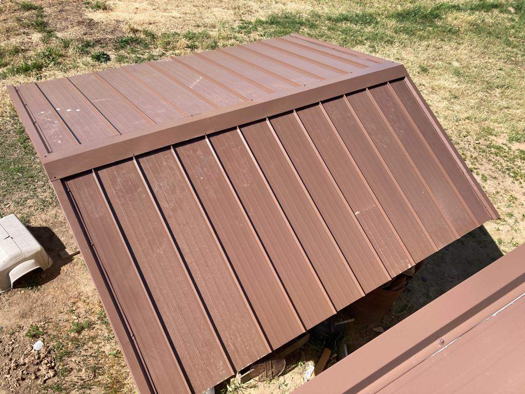 Metal roofing installation using Standing seam metal roofing system by Straight Edge Roofing Inc