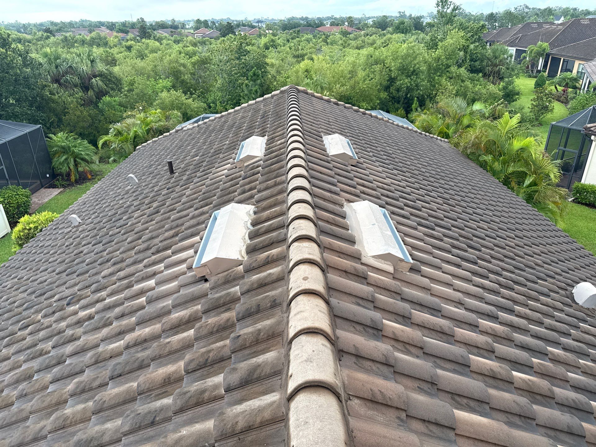Concrete Tile Roof, Paver Driveway & Lanai Cleaning – Artisan Lakes Esplanade, Palmetto, FL by Sunshine AquaWash