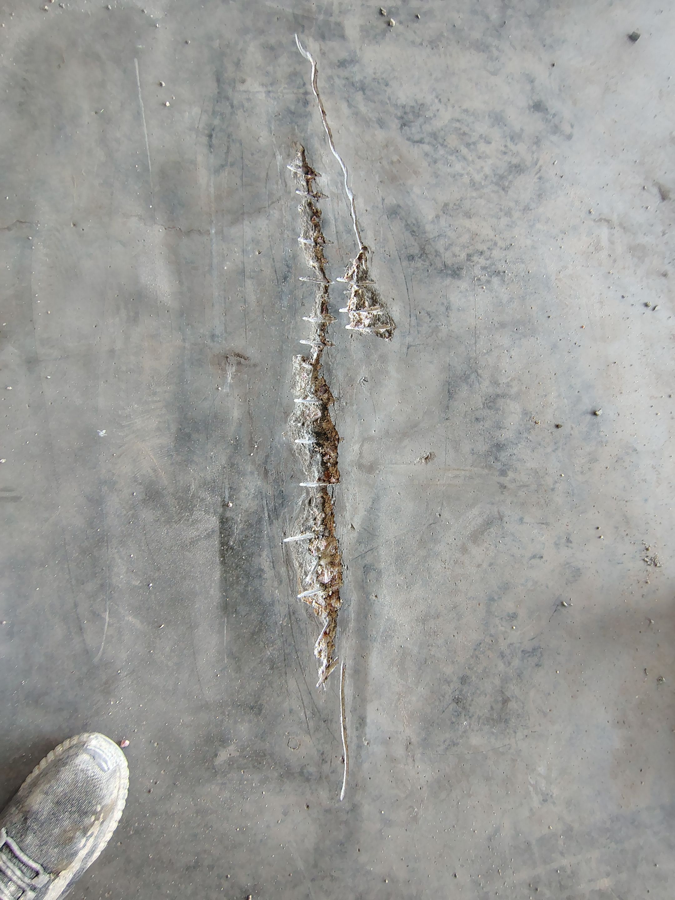 Multi-Car Garage Concrete Coating and Crack Repair in Dell Rapids by Select Painting, Coatings & Garage Cabinets