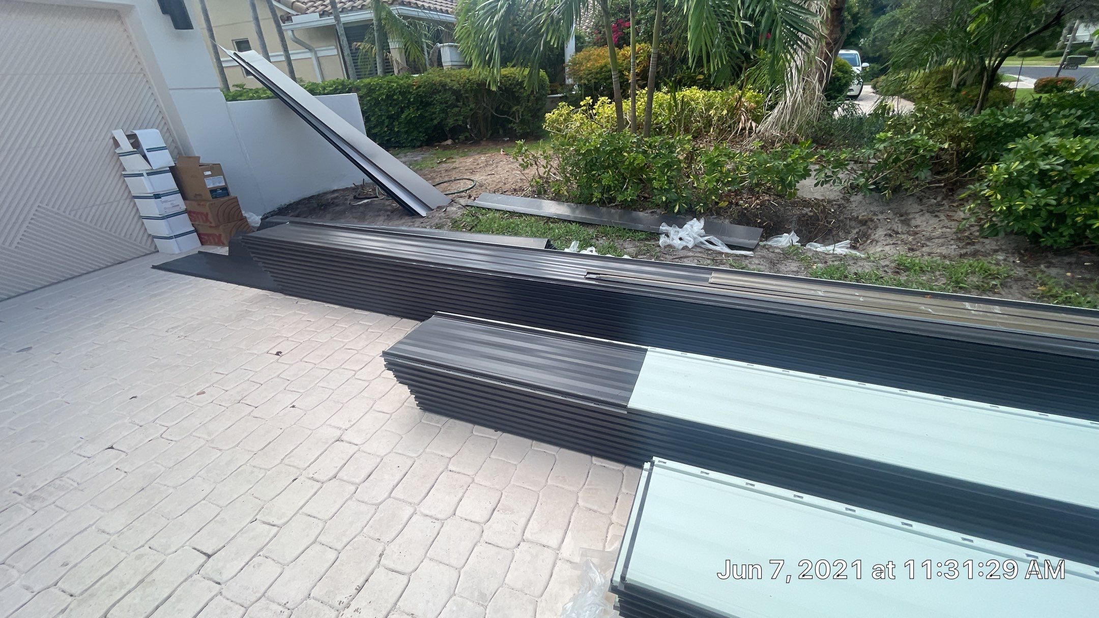 Residential Roofing Installation using 1" Nail strip metal roof by BLUES BROTHERS ROOFING