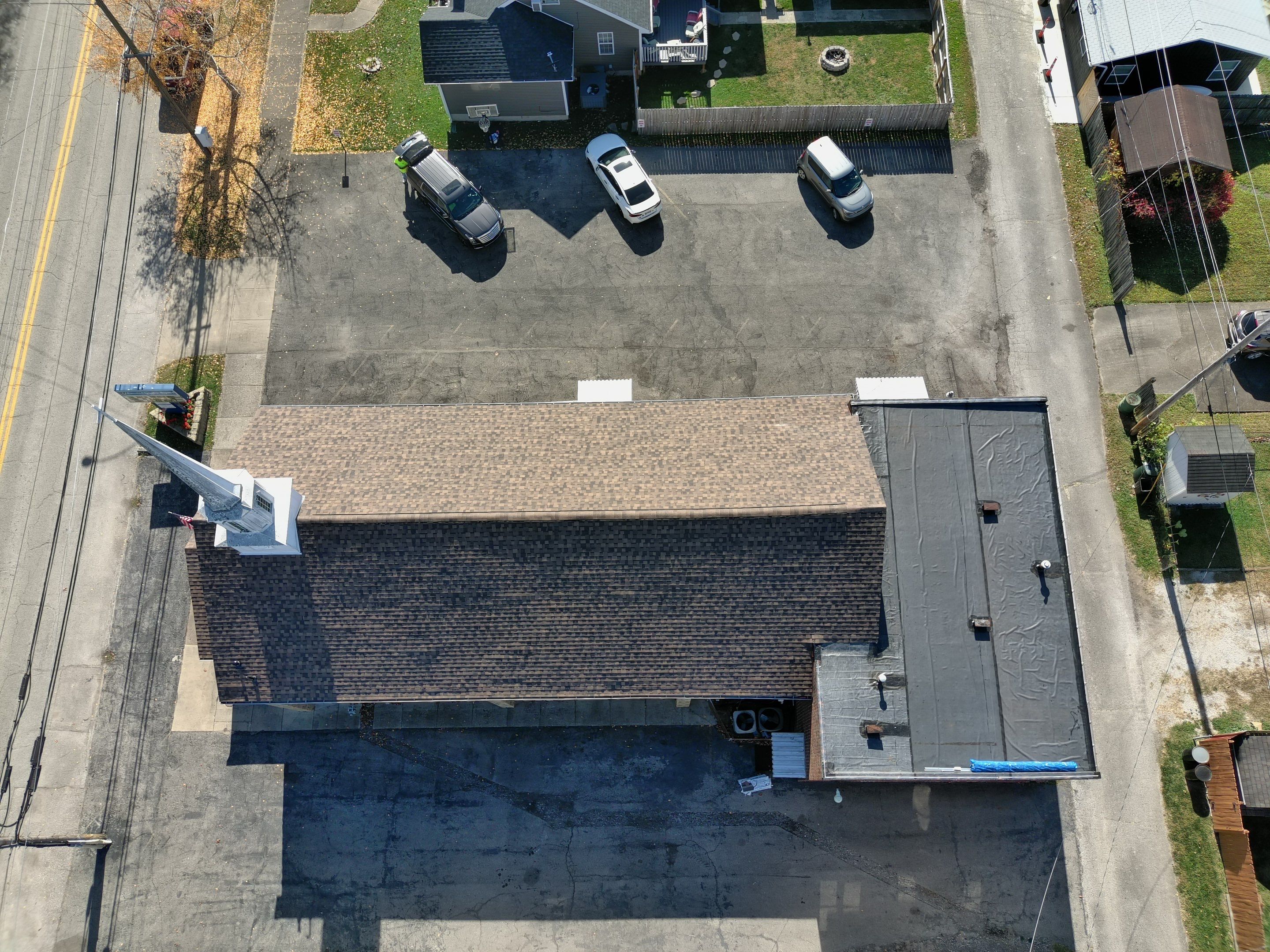 Commercial Roofing Installation using Performance Shingles by Mr. Roofer