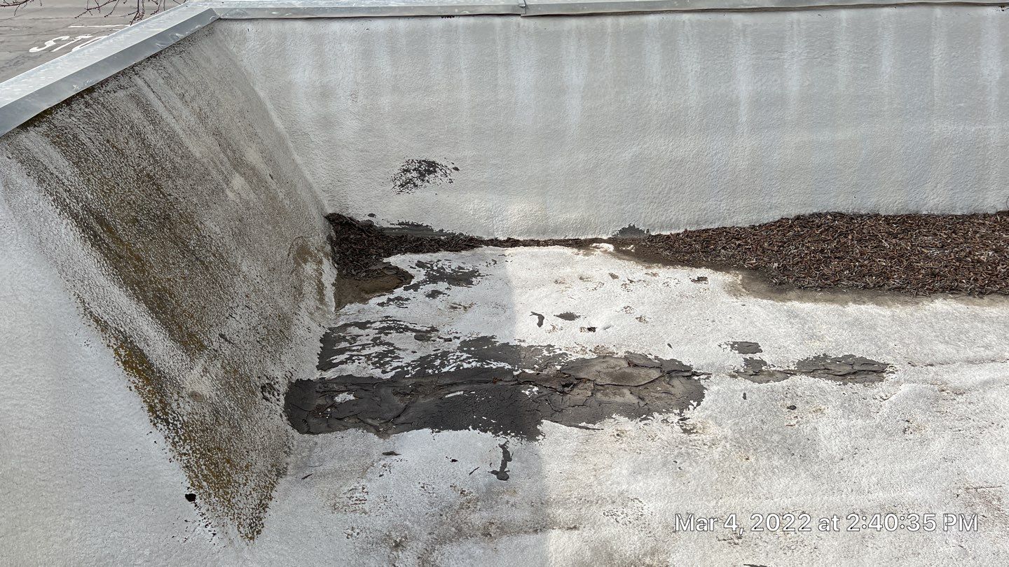 Commercial Roofing Installation using General Coatings acrylic coatings and spray foam by Straight Edge Roofing Inc