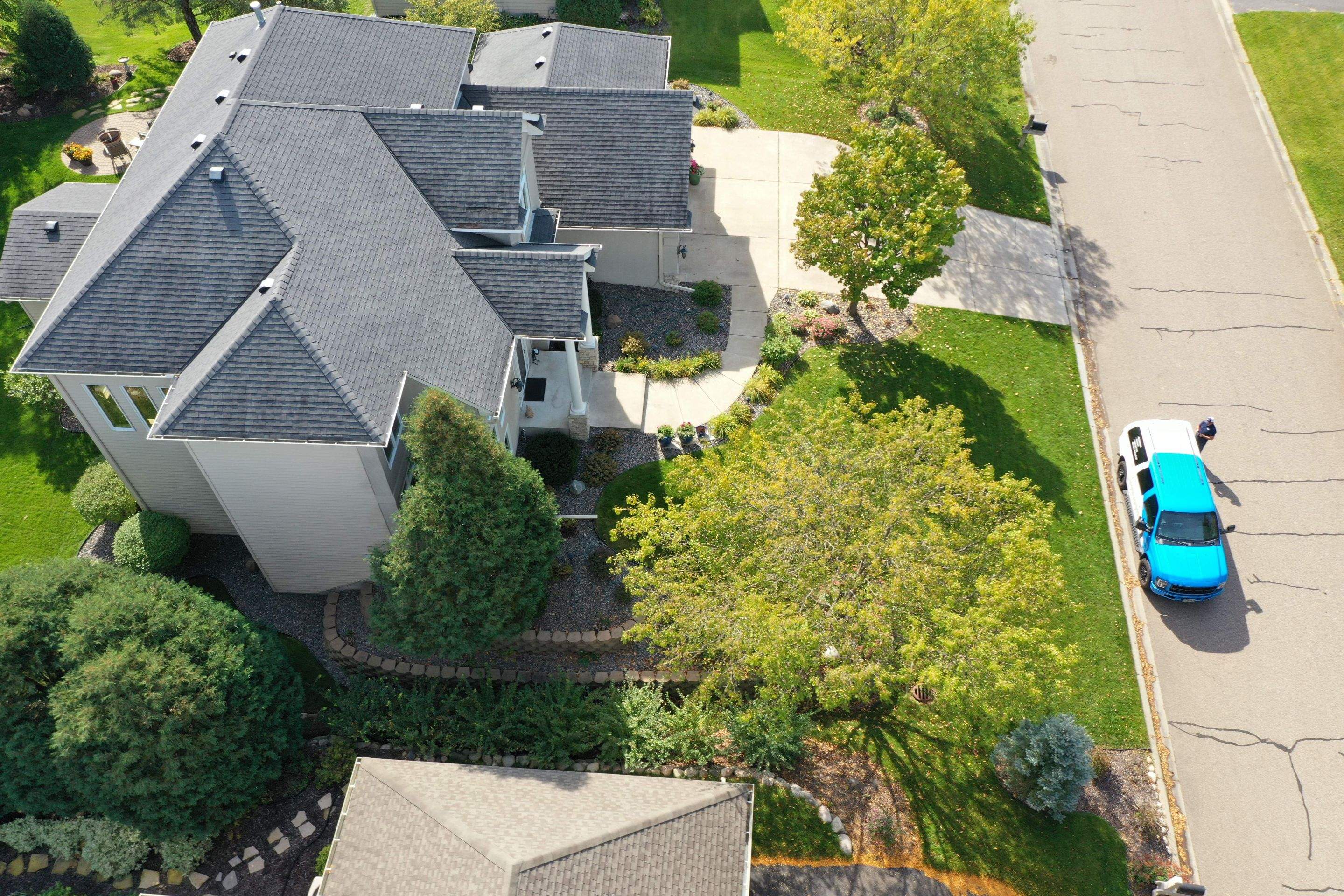 Residential Roofing Installation using Certainteed Landmark Moire Black by MODERN EXTERIOR SYSTEMS