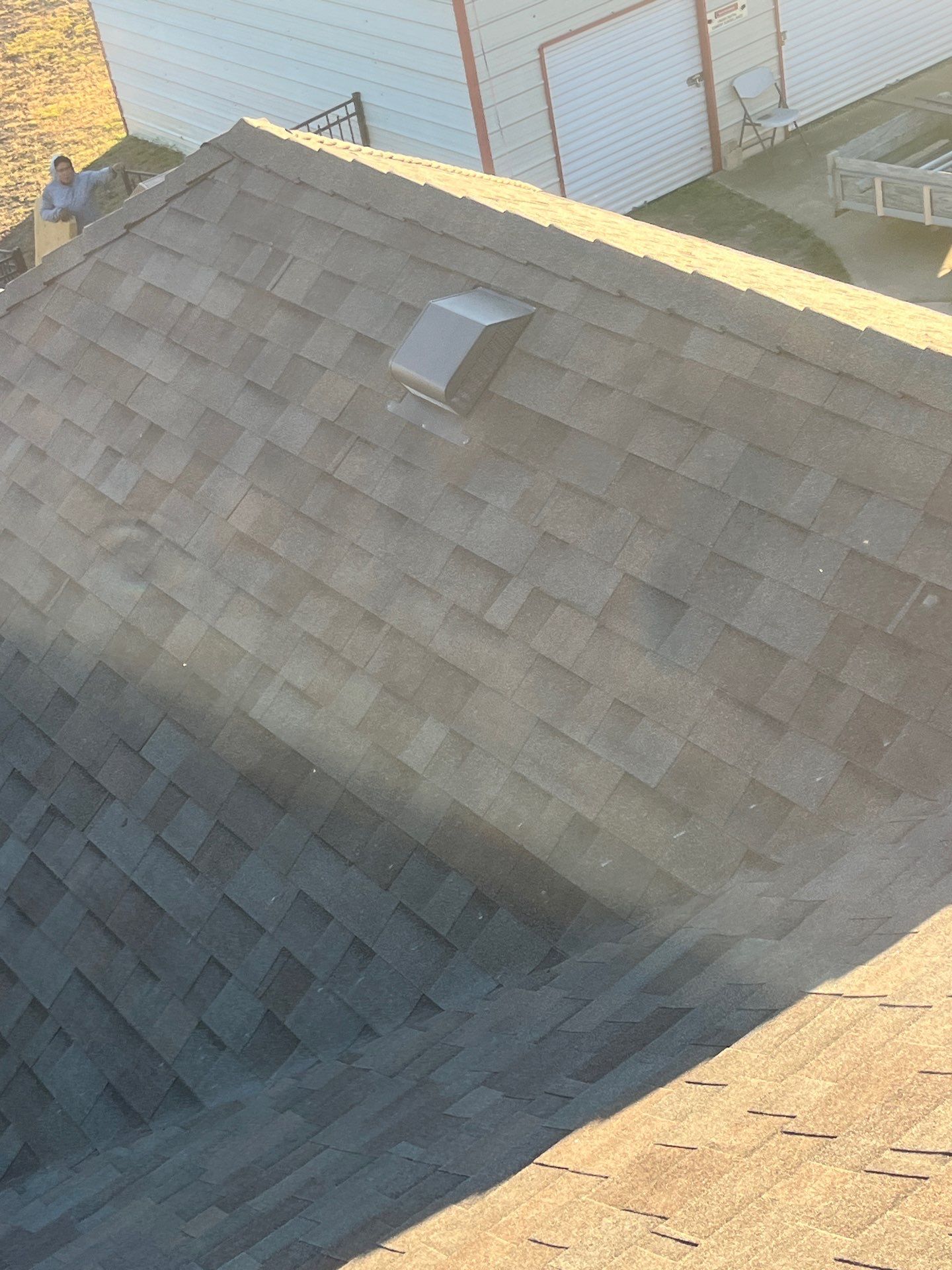 Brick with Malarkey Natural Wood by Tejas Roofworks + Restoration