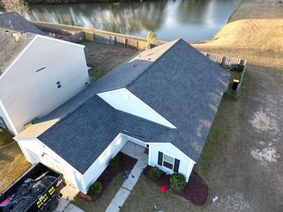 Residential Roofing Installation using Atlas Pinnacle Pristine Black Shadow.