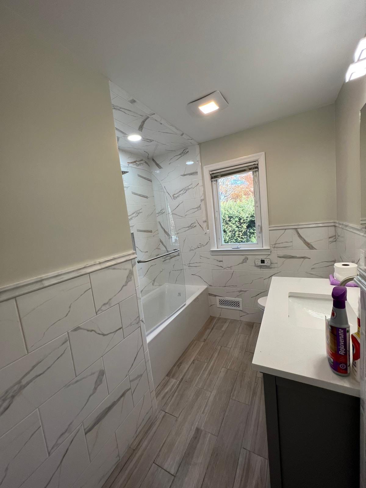 Bathroom Remodel using Tile by Home Concepts Construction