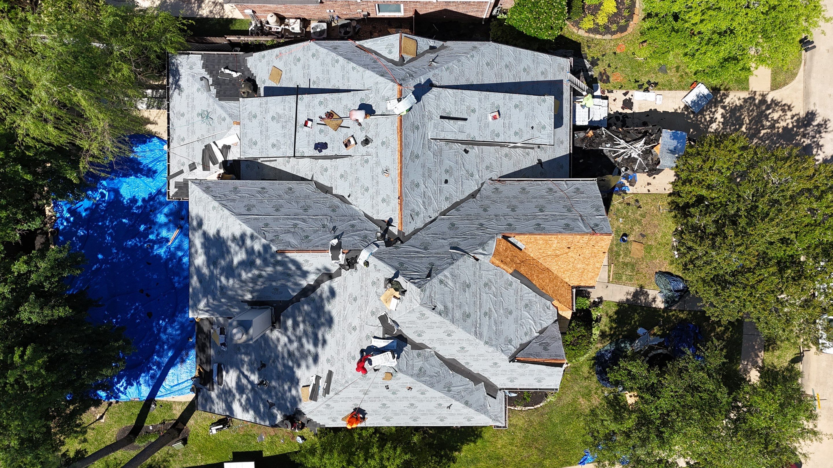 Residential Roofing Installation using Architectural Shingles by Core Four Roofing