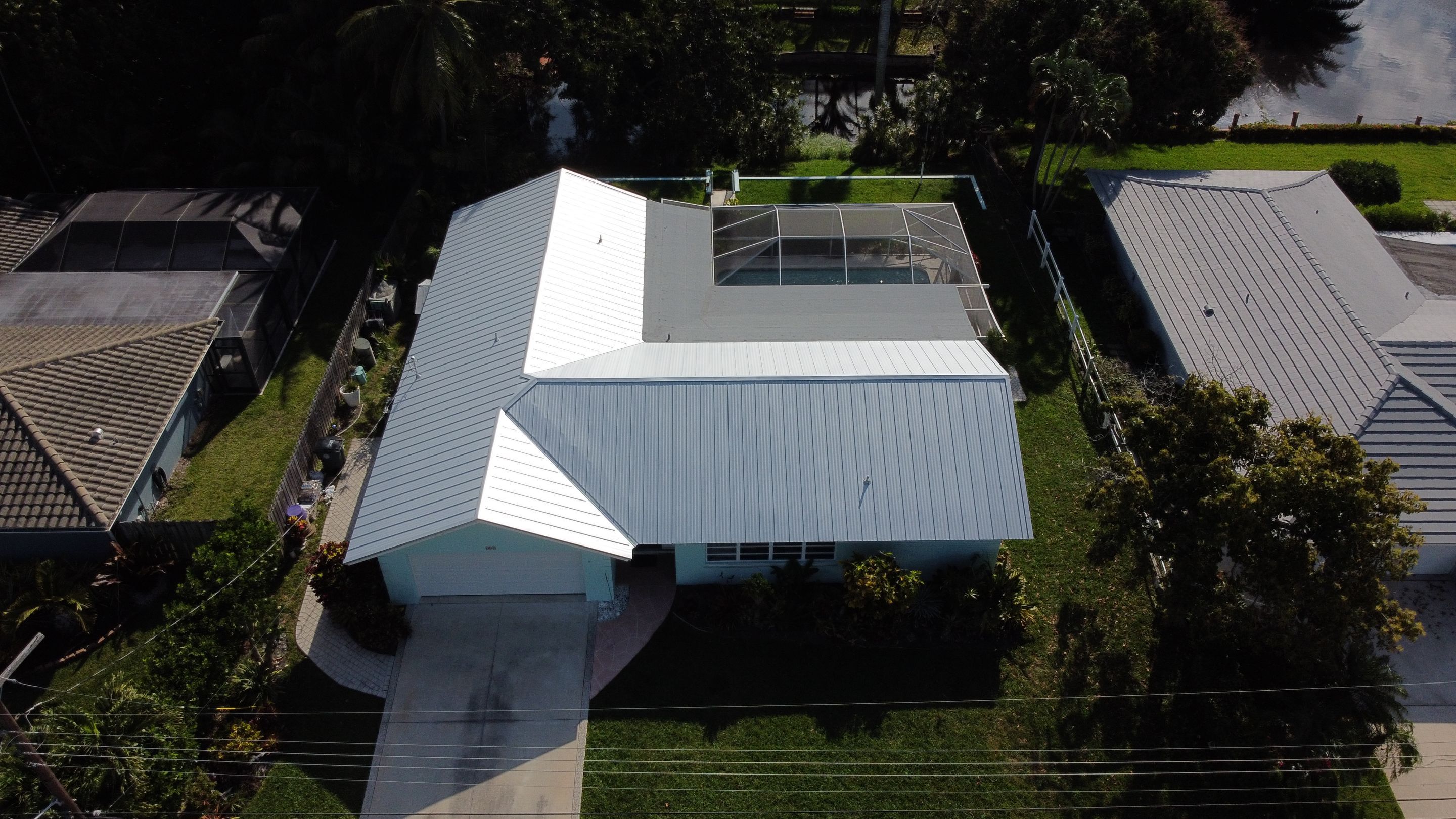 Residential Roofing Installation using 1" Nail strip metal roof by BLUES BROTHERS CONSTRUCTION CORP