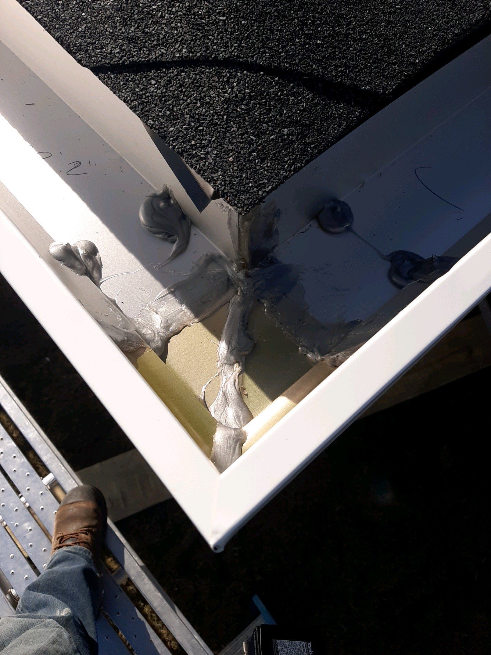 Seamless Gutter Installation Using White K-Style Gutters by Gutter Professors