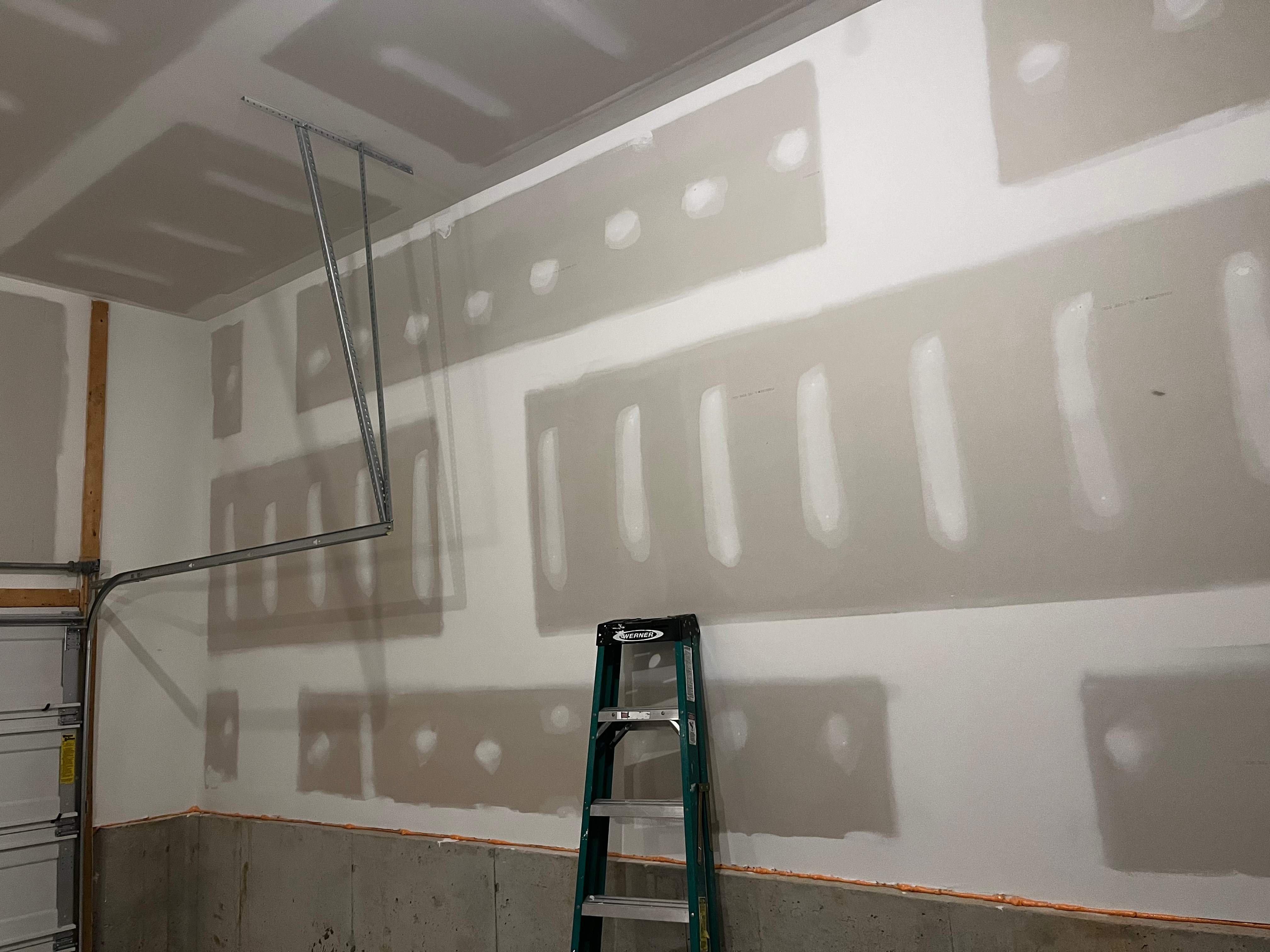 Garage ceiling and walls painting  by Laser Focused Solutions LLC