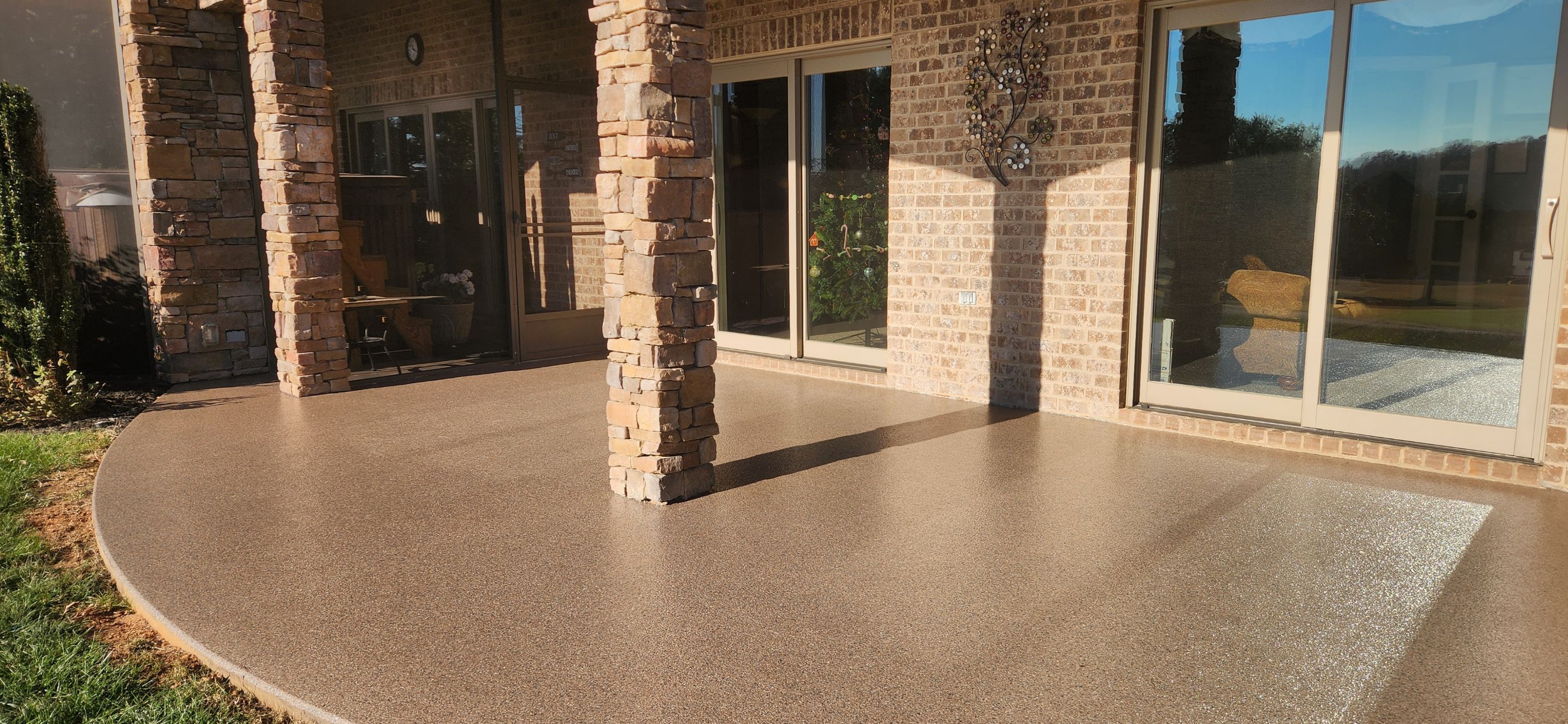 Garage & Back Patio Upgrade with Obsidian & Garnet by Elite Floor Solutions