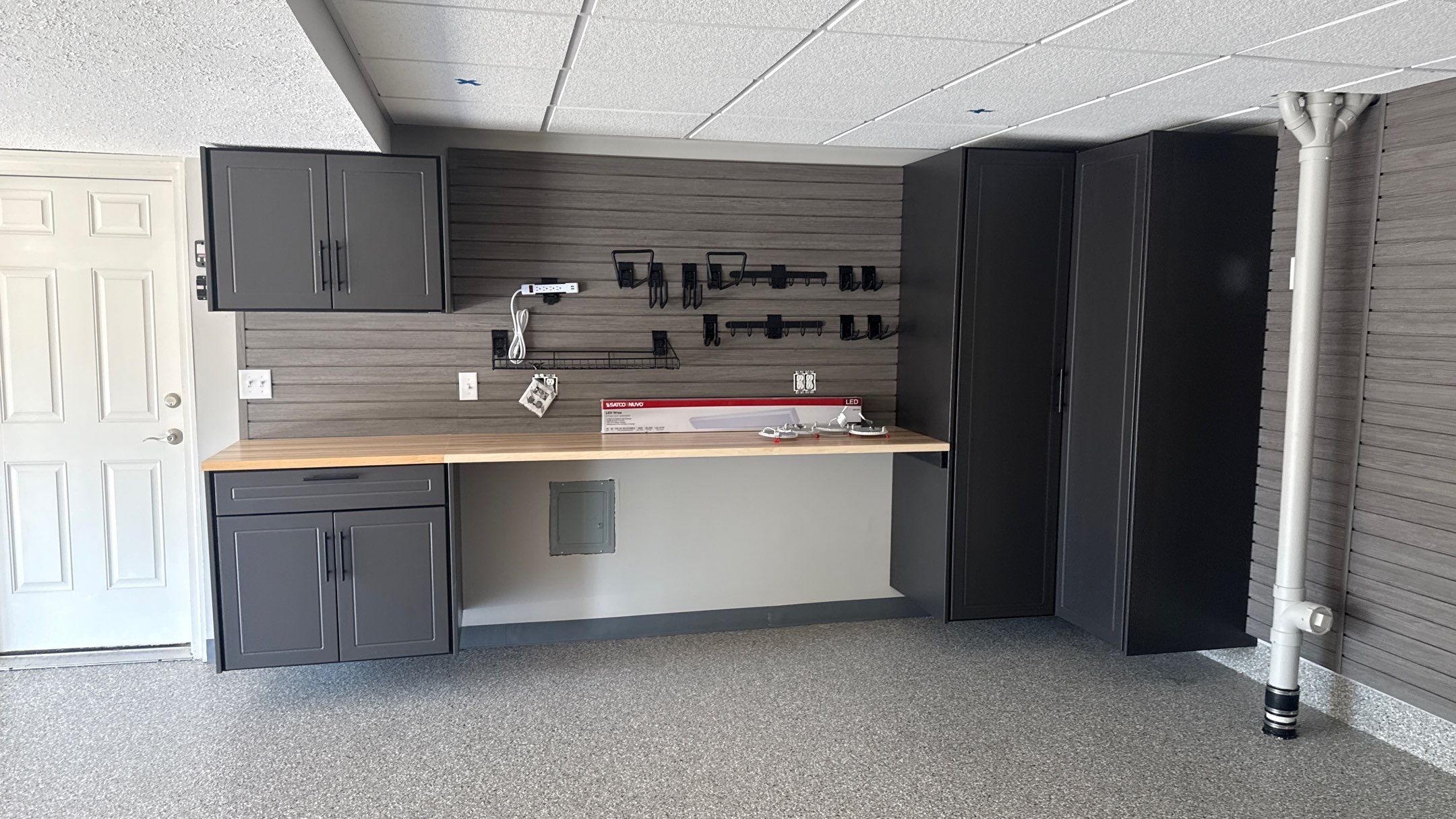 Wow Look Floor to Ceiling Slatwall  by Banner Garage