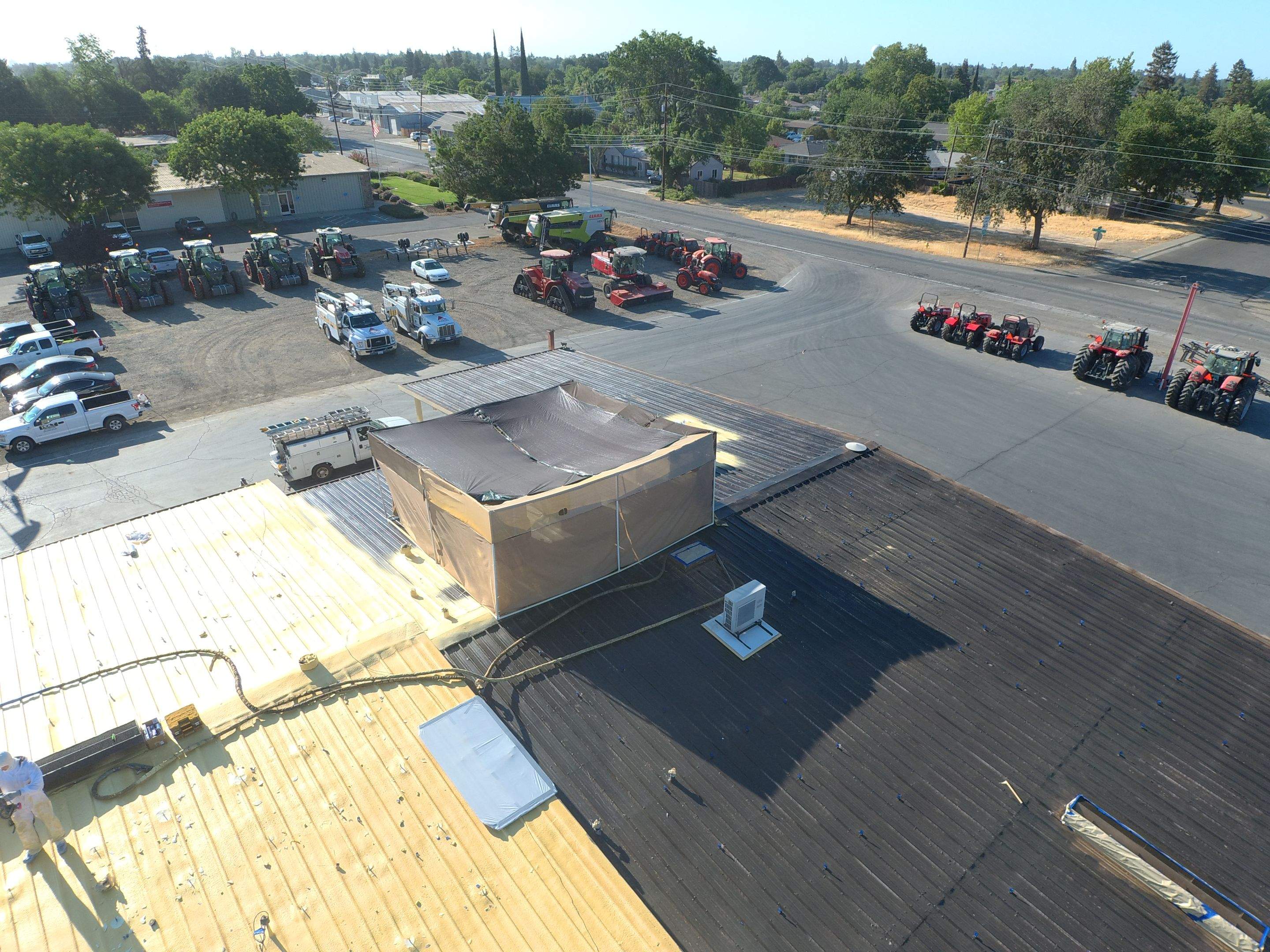 Spray foam and coatings using Conklin Benchmark/PUMA XL coatings and spray foam by Straight Edge Roofing Inc