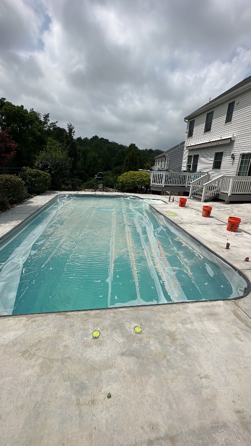 Pool Deck + Driveway + Garage Project in Venetia by Floors in a Day, Inc