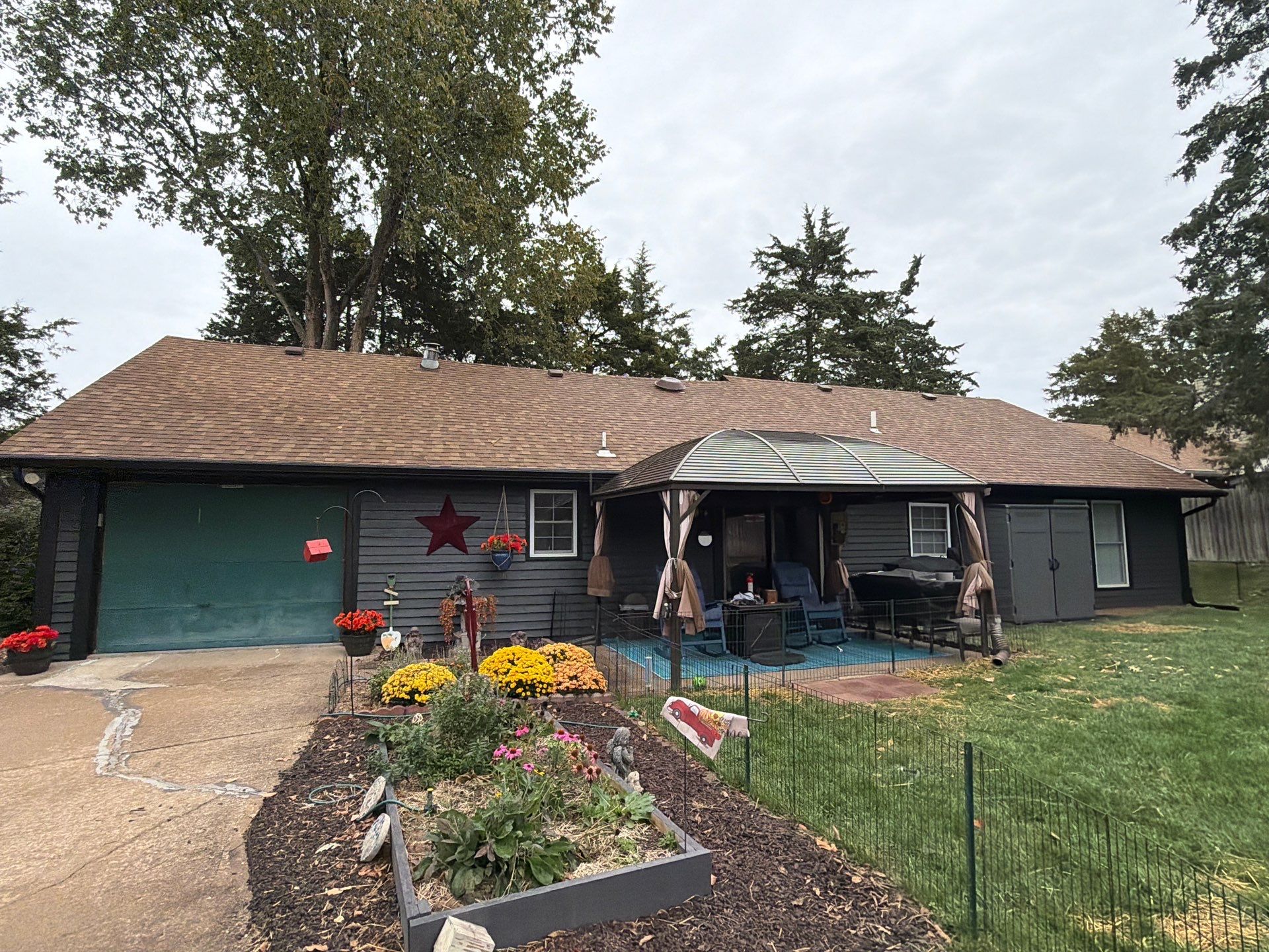 Wood siding refresh by Pezley Painting