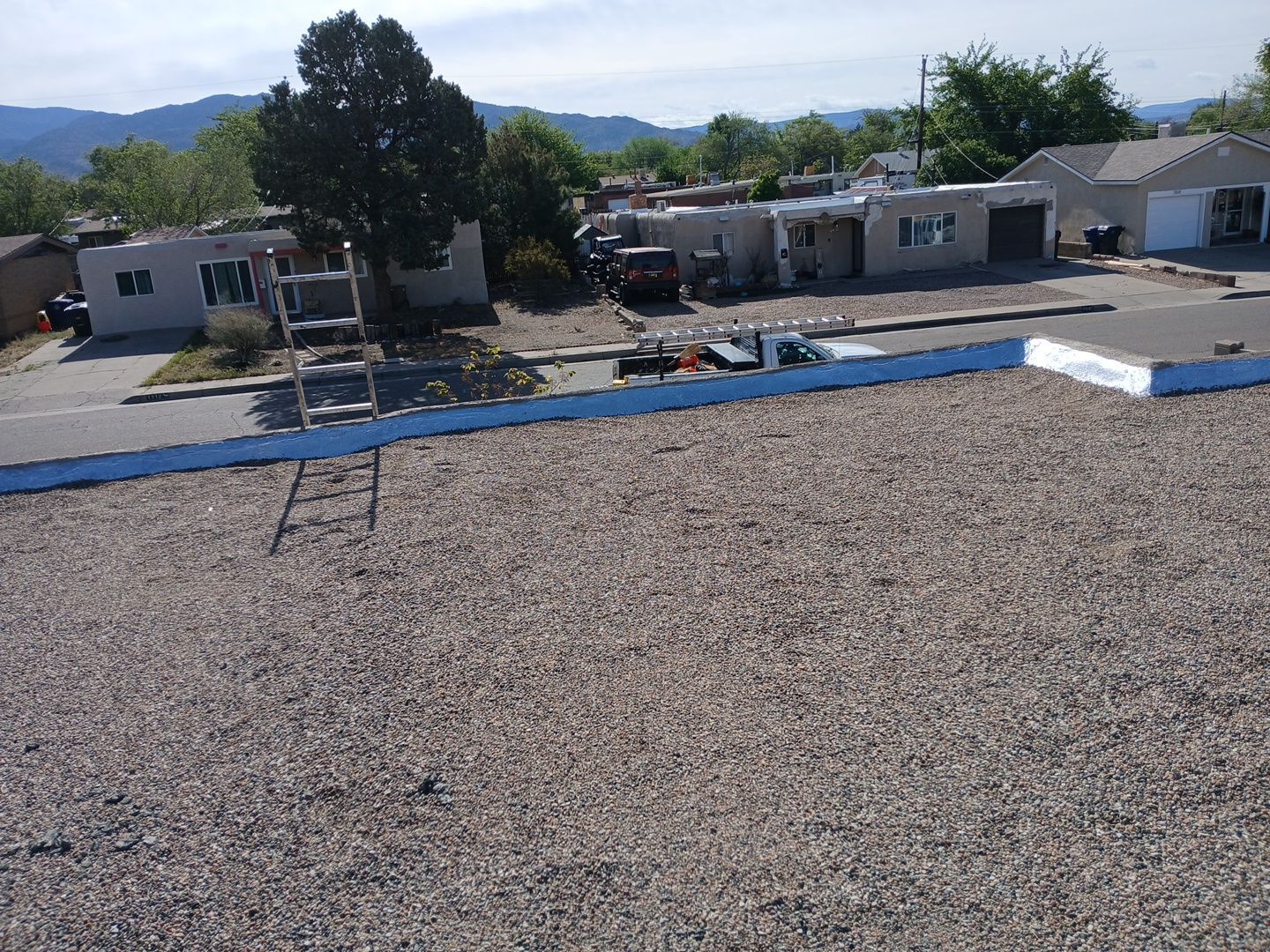 Albuquerque Flat Roof Replacement Using Tan Modified Bitumen Membrane by Doyle Roof Masters Inc