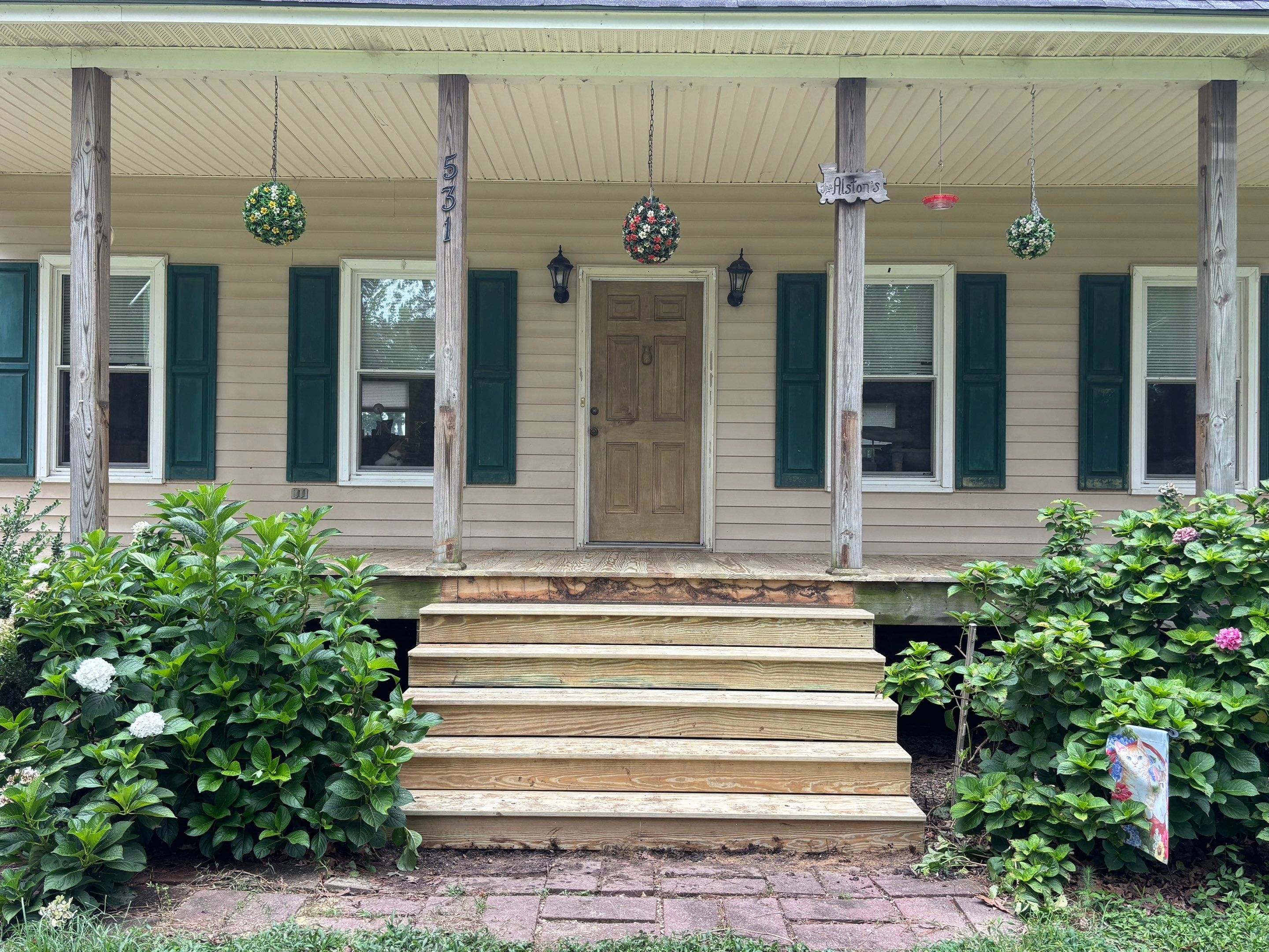 Front Porch Deck Resurfacing and Wood Stair Installation in Battleboro by The Remodeling Company
