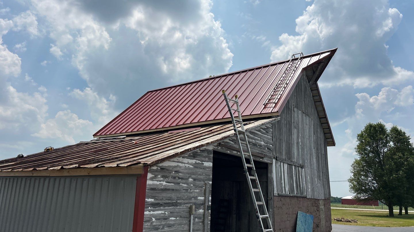 Residential Roofing Installation using Standing Seam Metal - Barn Red by RoofX 