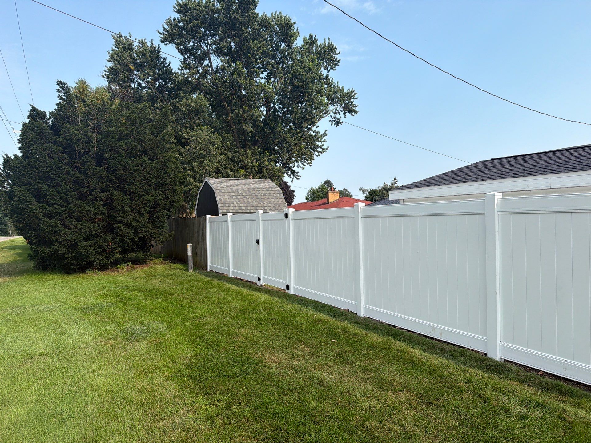 White Vinyl Privacy Fence Installation and Side Yard Upgrades in Waterloo by Perfect Picket Fence and Stain