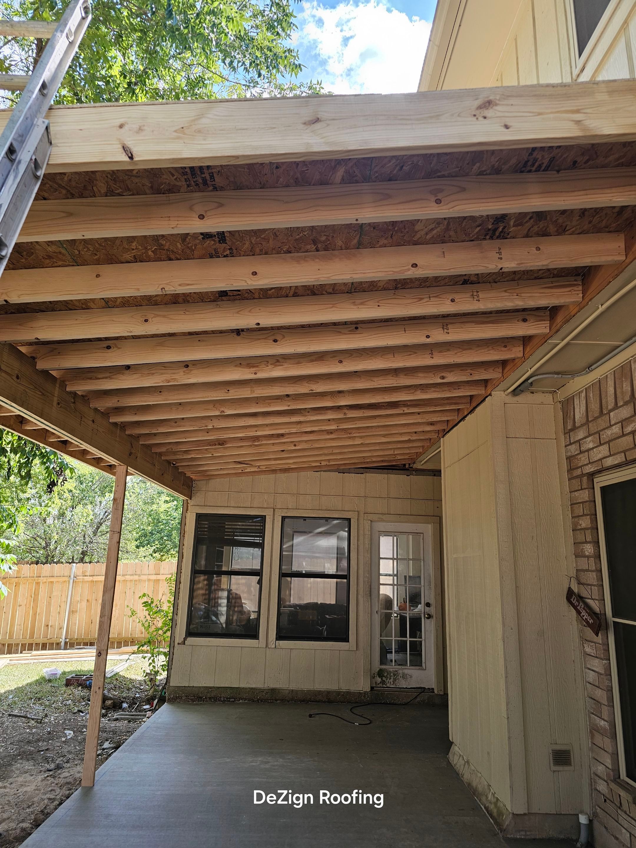 Beautiful New Covered Patio by DeZign Roofing & Exteriors
