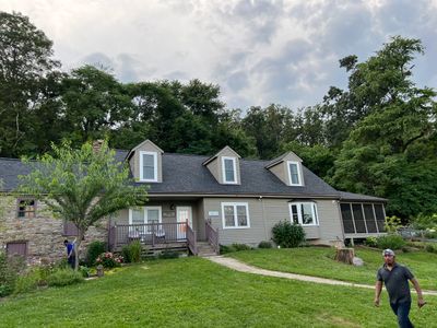 Residential Roofing Installation using Atlas Pinnacle Pristine Black Architectural Shingles