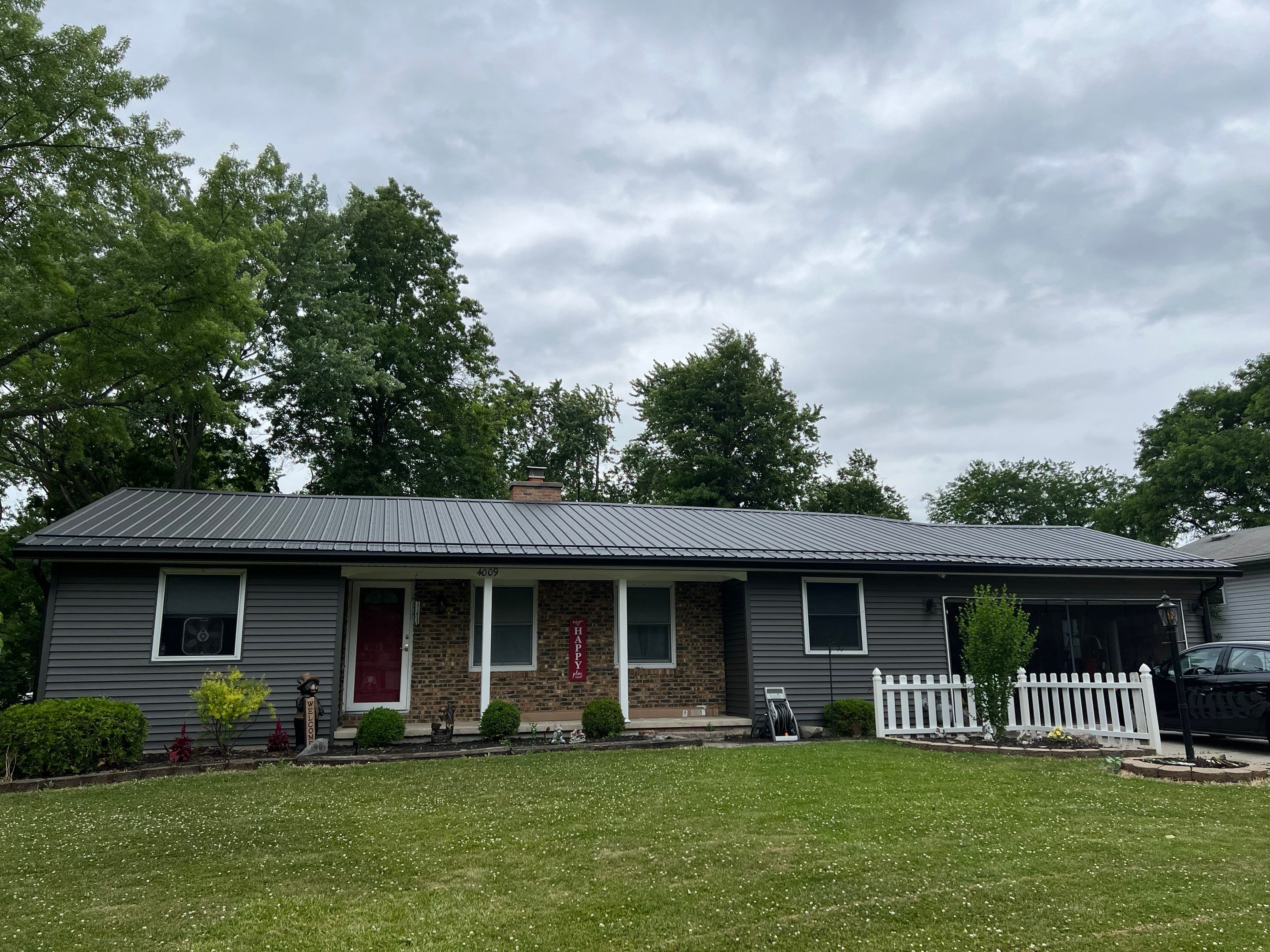 Complete Exterior Transformation - Exposed Fastener Roofing System by 4Ever Metal Roofing