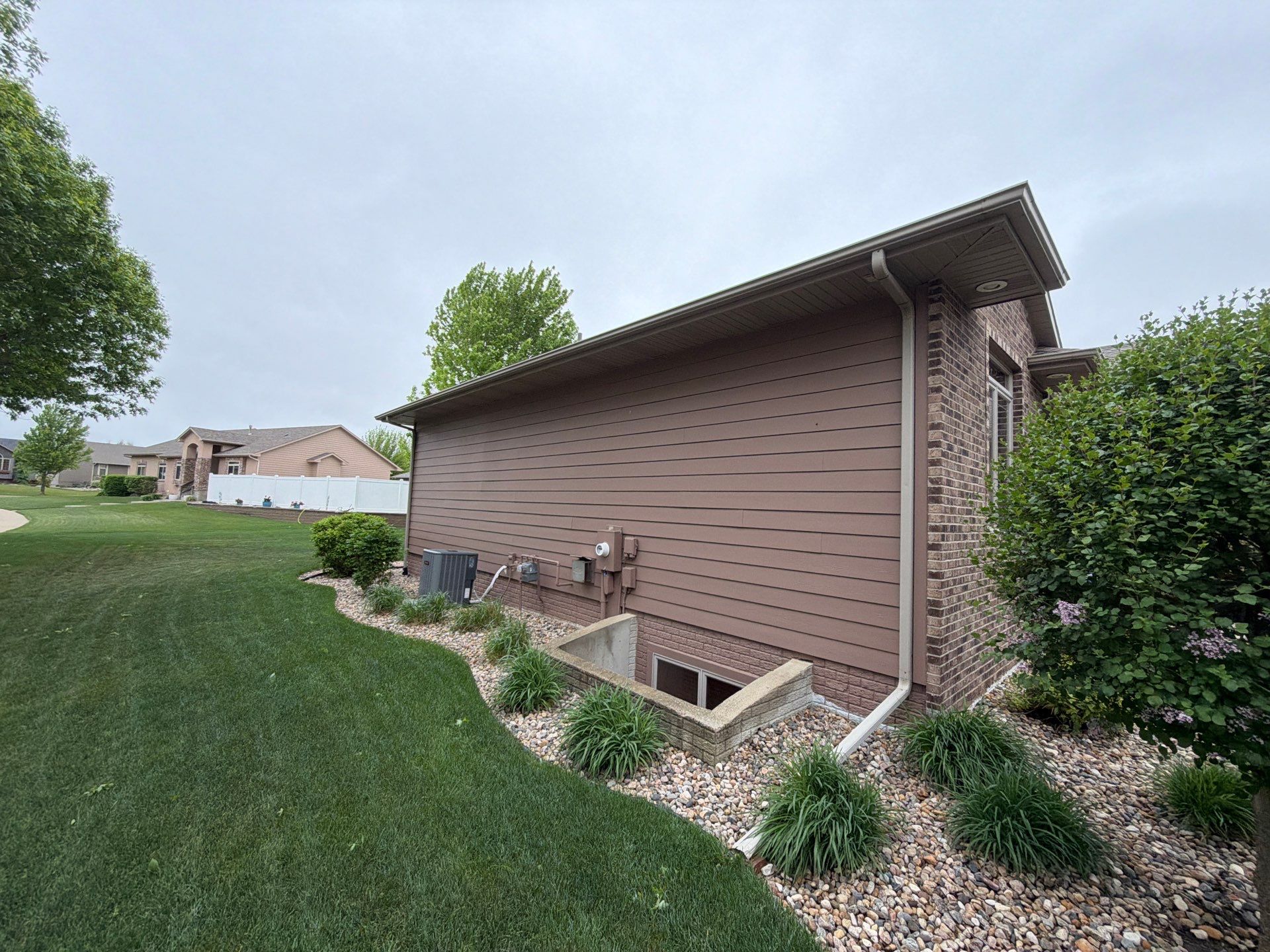 Exterior Painting and Wooden Deck Staining in Sioux Falls by Select Painting, Coatings & Garage Cabinets