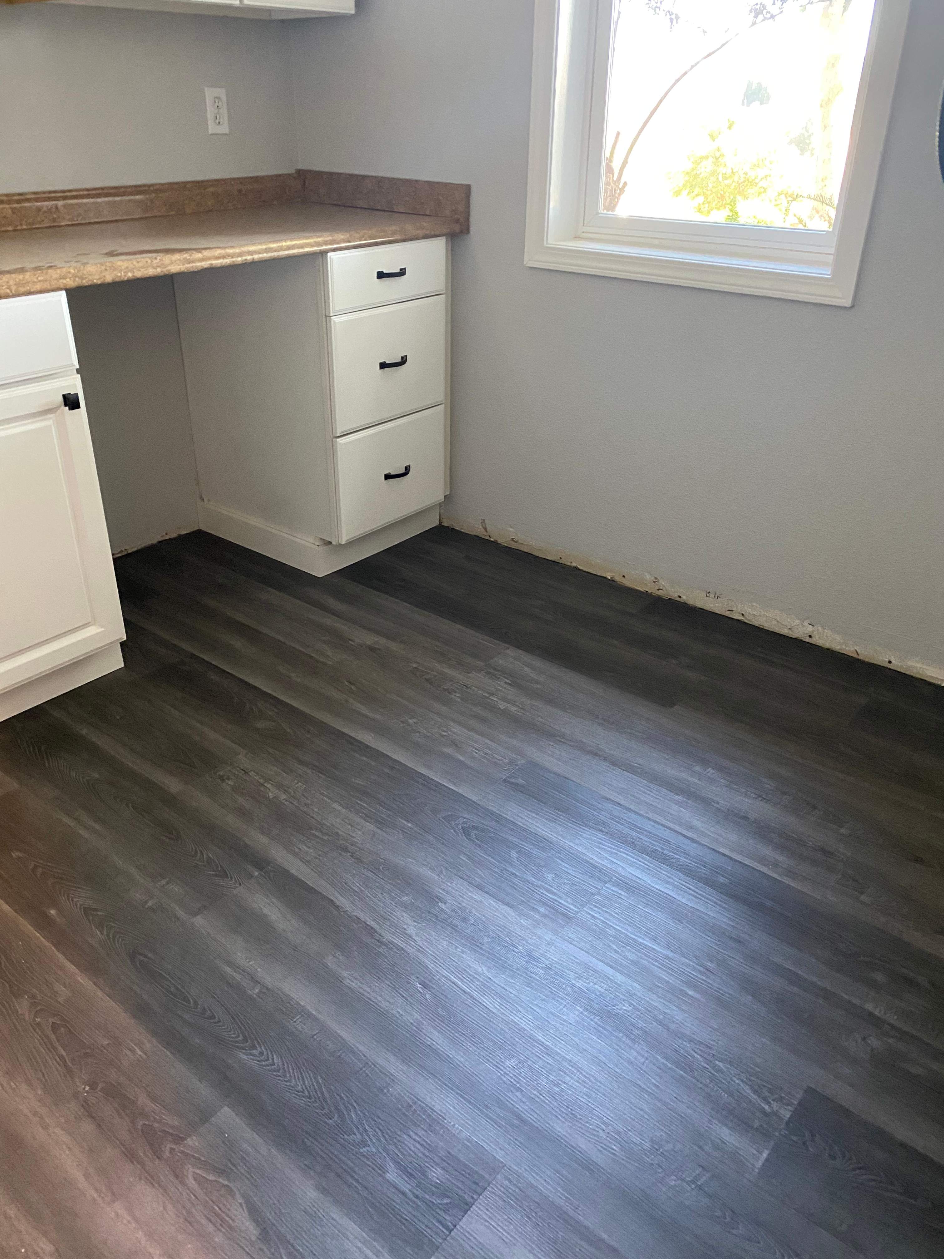 LVP Flooring for newly remodeled kitchen in Newcastle. by Footprints Floors South Sacramento