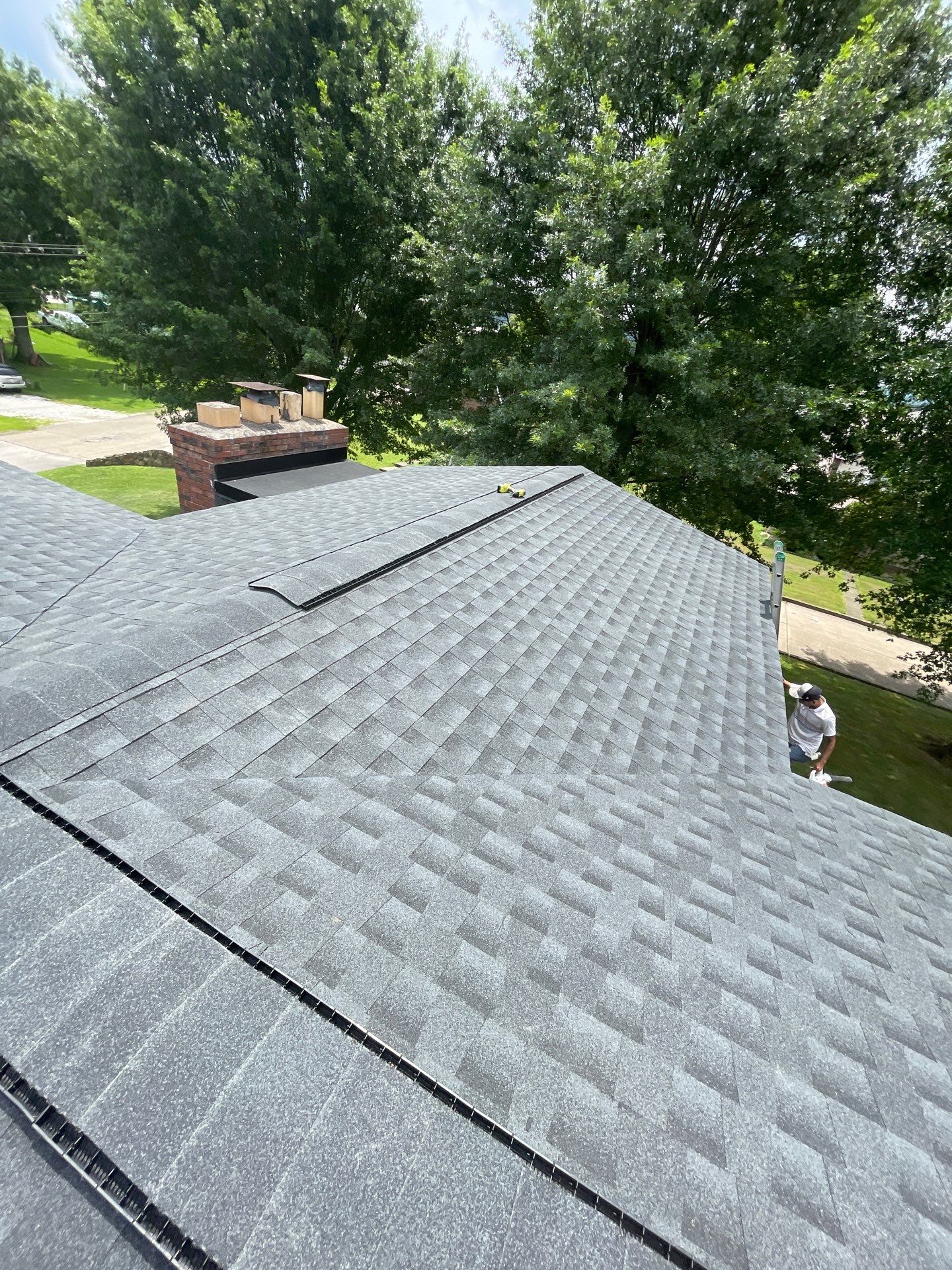Residential Roofing Installation using GAF Timberline HDZ Charcoal by Rainstoppers Roofing
