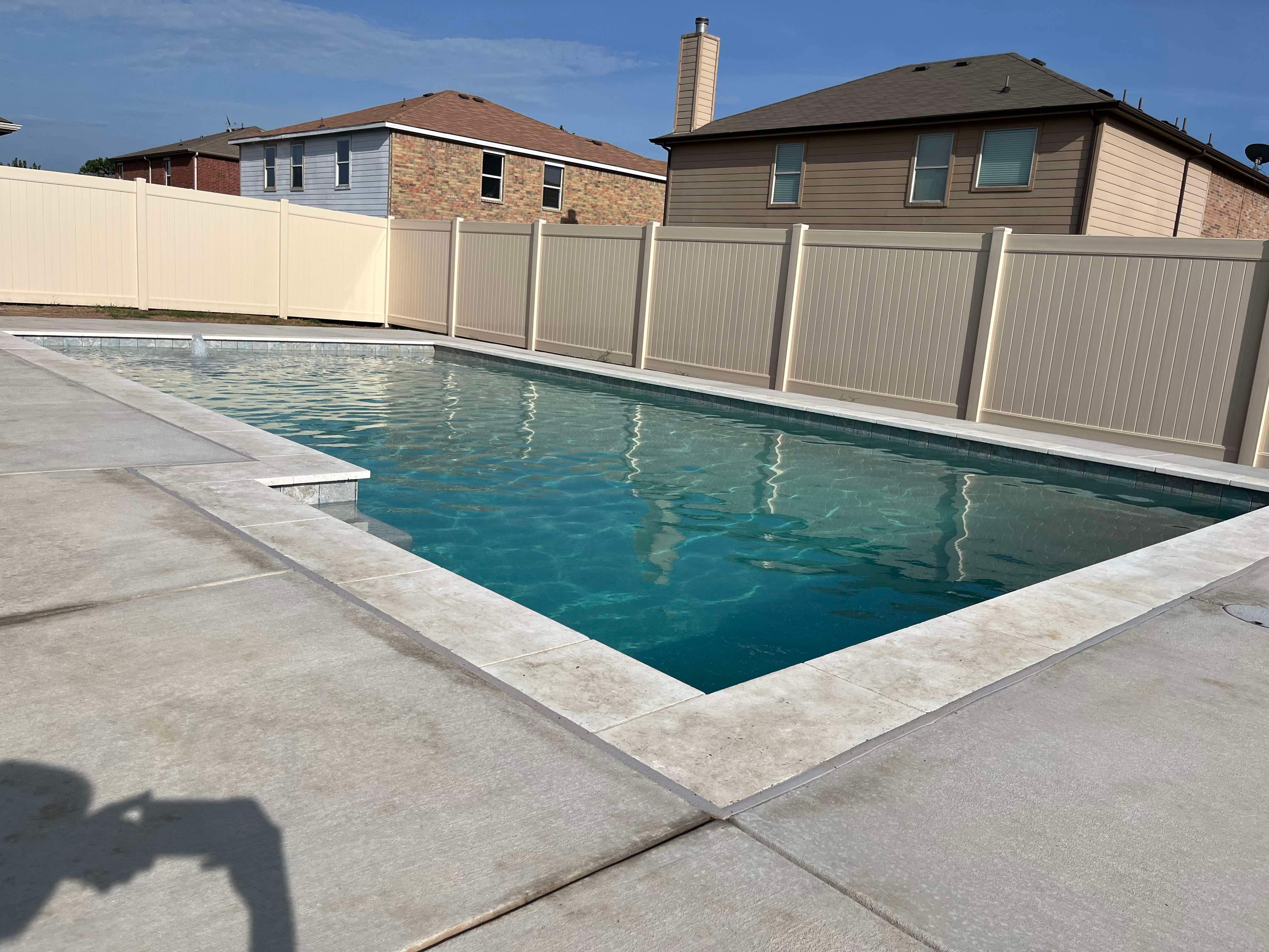 Geometric Pool with Tanning Ledge by Pinnacle Pools and Spas - DFW