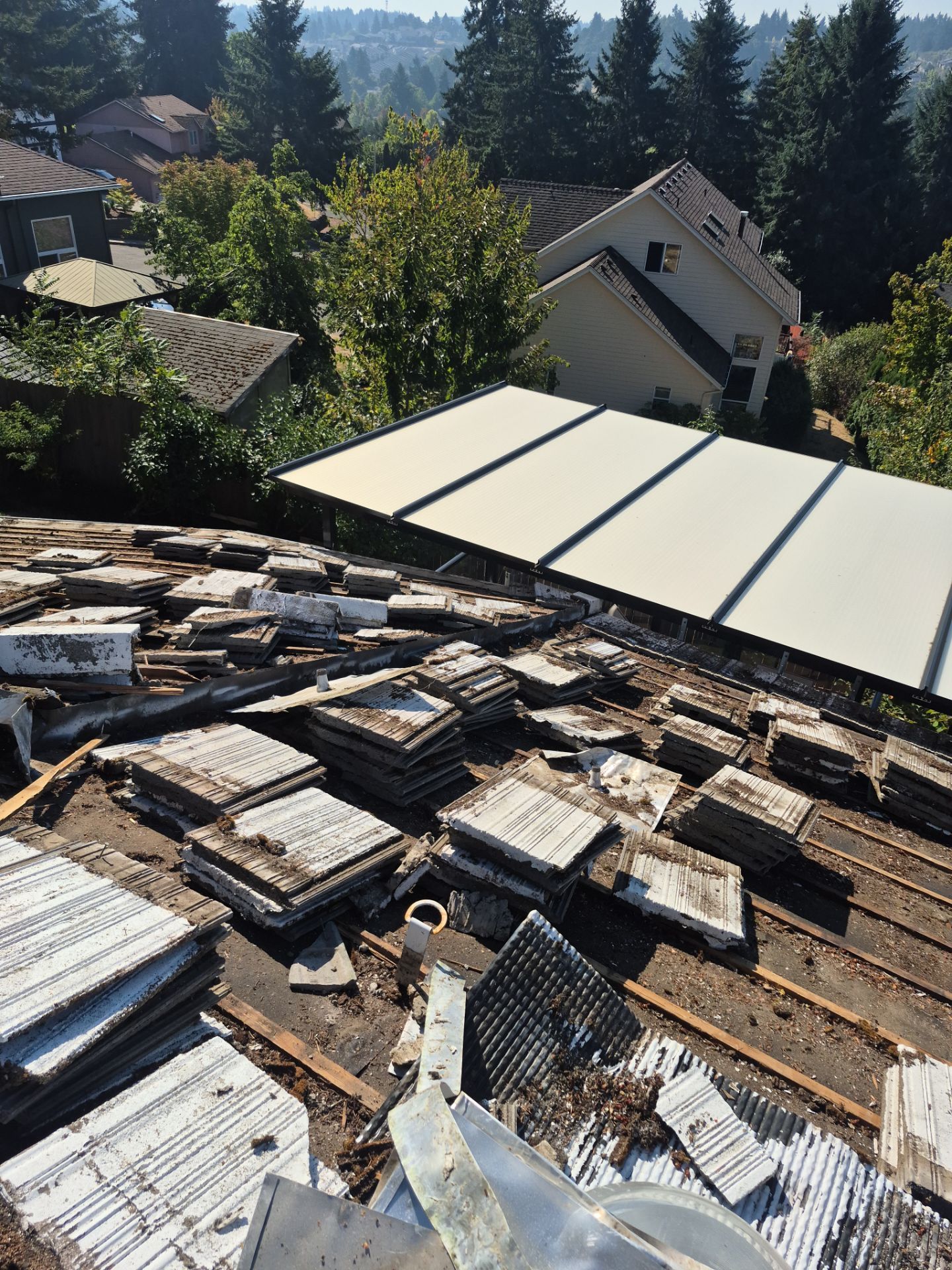 Granite Black Residential Roof Replacement by Orezona Building & Roofing Company, Inc.
