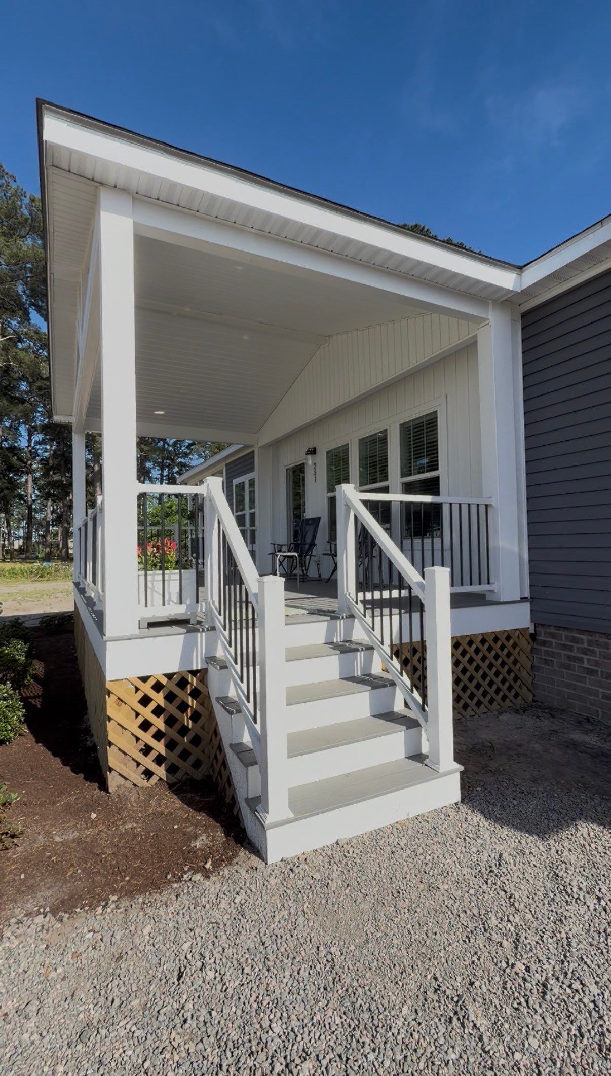 Custom Trex Covered Deck and Gabled Roof in Winterville by The Remodeling Company