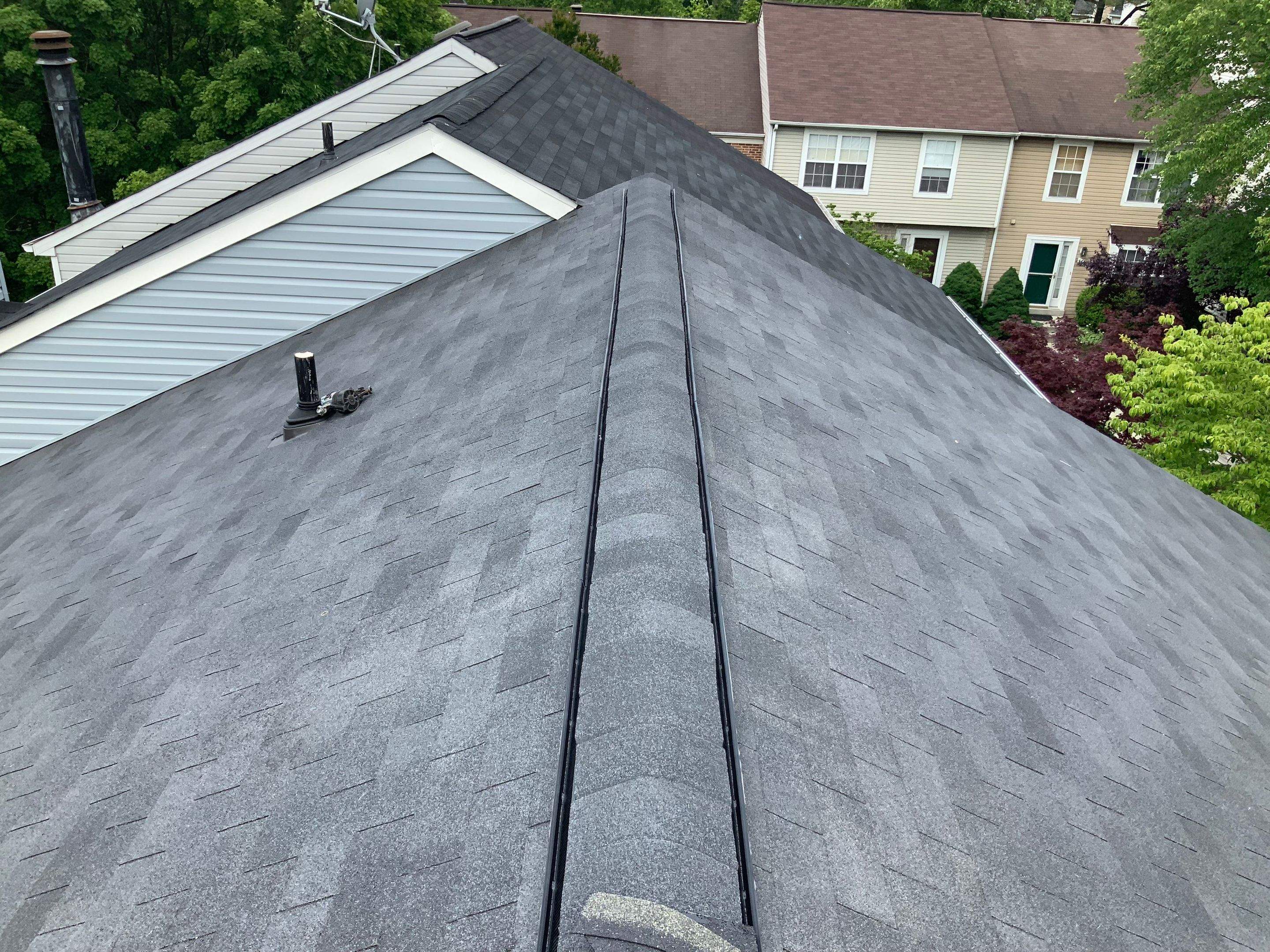 Residential Roofing Installation using XT-25 Color Moire Black by Alpha Design Services