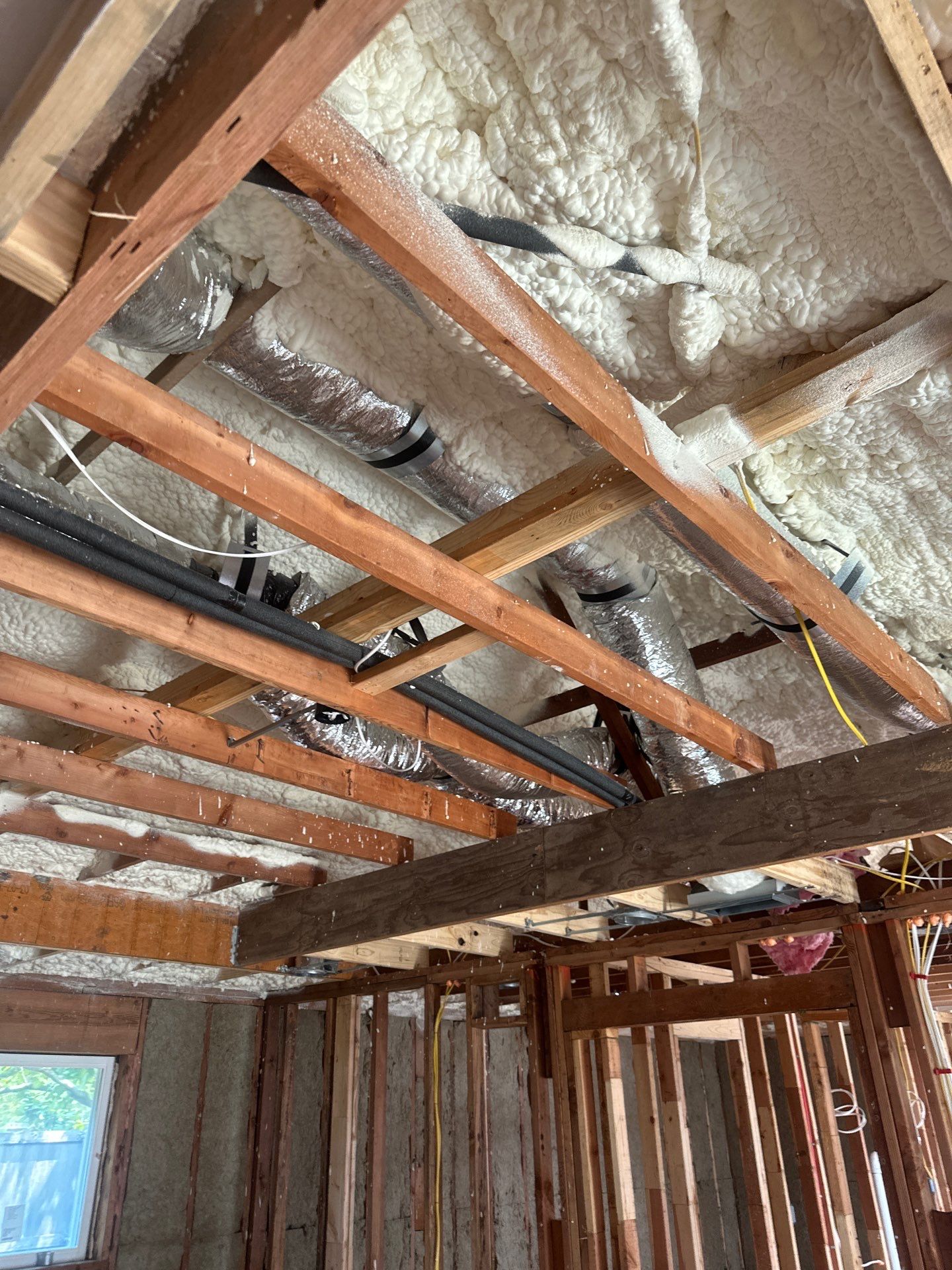 Open cell spray foam & rockwool job completed in Dallas TX by Apex Insulation Solutions