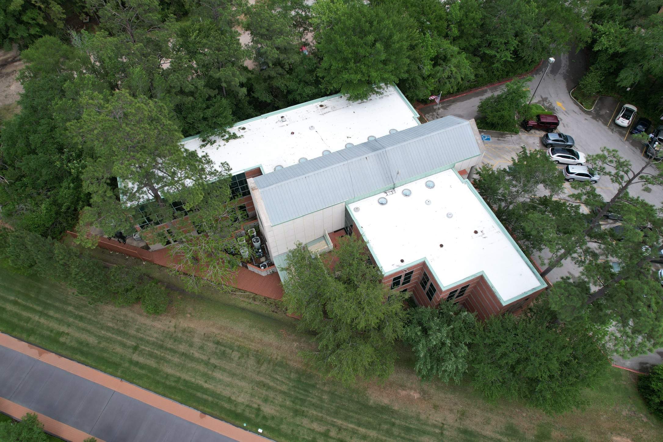 Commercial Roofing Restoration using GAF Unisil Silicone by STX Roofing